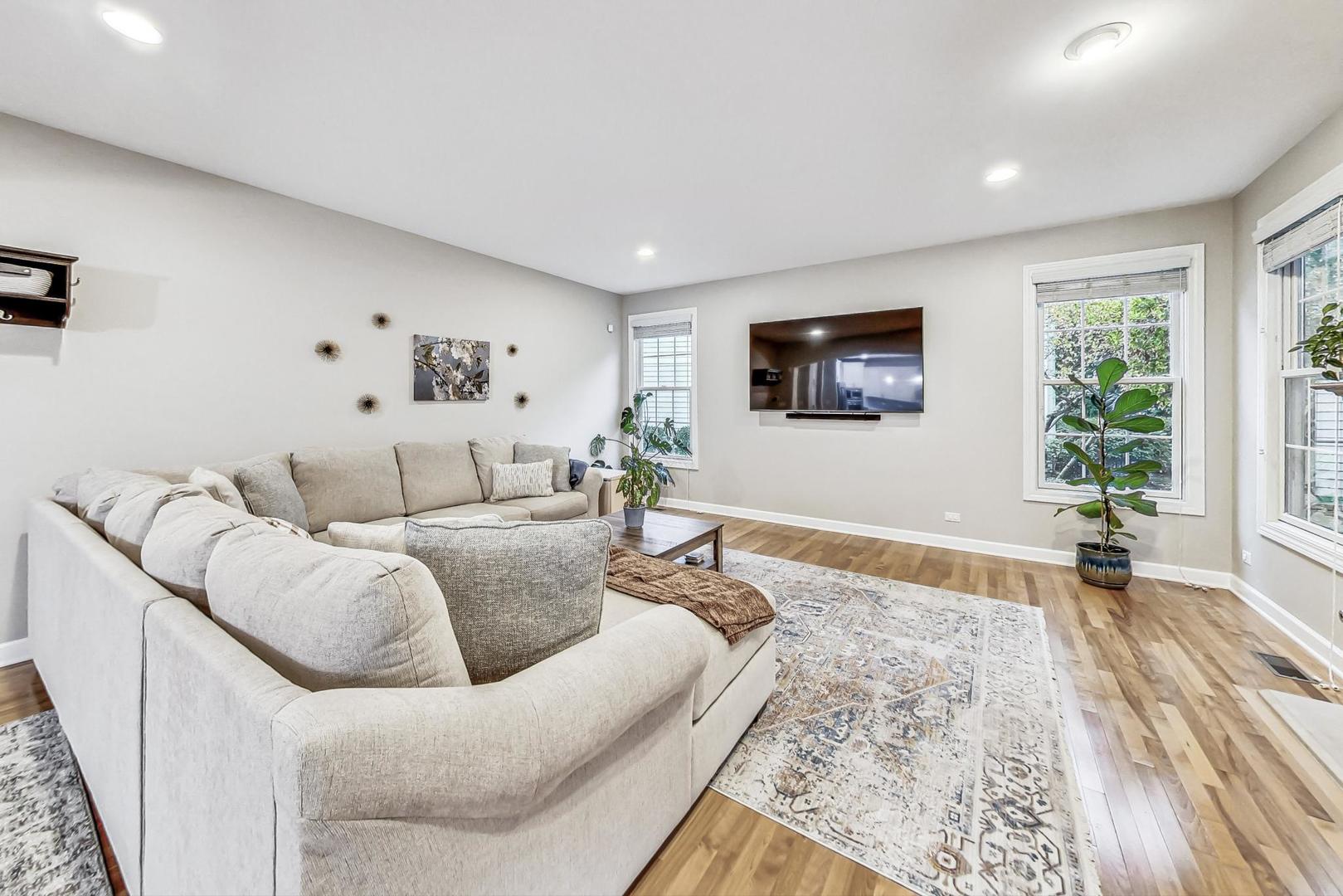 2680 Summit Drive Glenview, IL 60025 - Photo 20 of 70 a living room with furniture and a flat screen tv