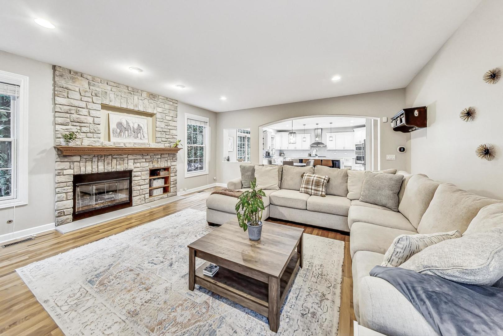 2680 Summit Drive Glenview, IL 60025 - Photo 21 of 70 a living room with furniture and a fireplace