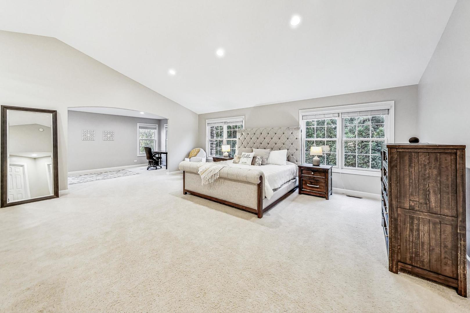 2680 Summit Drive Glenview, IL 60025 - Photo 26 of 70 a spacious bedroom with a bed and large window