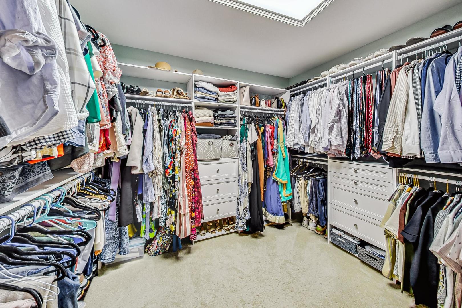 2680 Summit Drive Glenview, IL 60025 - Photo 34 of 70 a view of walk in closet with clothes and shoes
