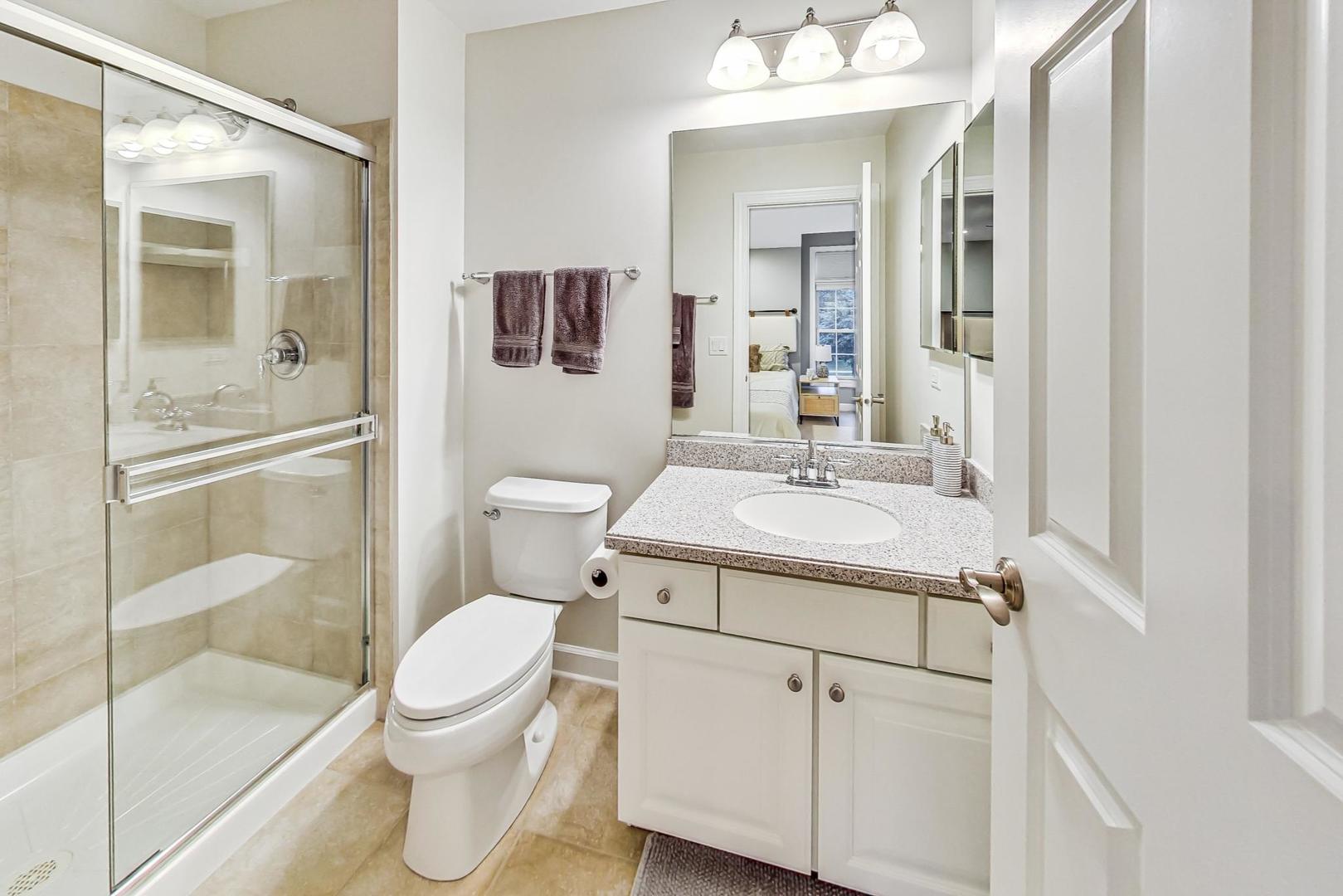 2680 Summit Drive Glenview, IL 60025 - Photo 39 of 70 a bathroom with a sink toilet and shower