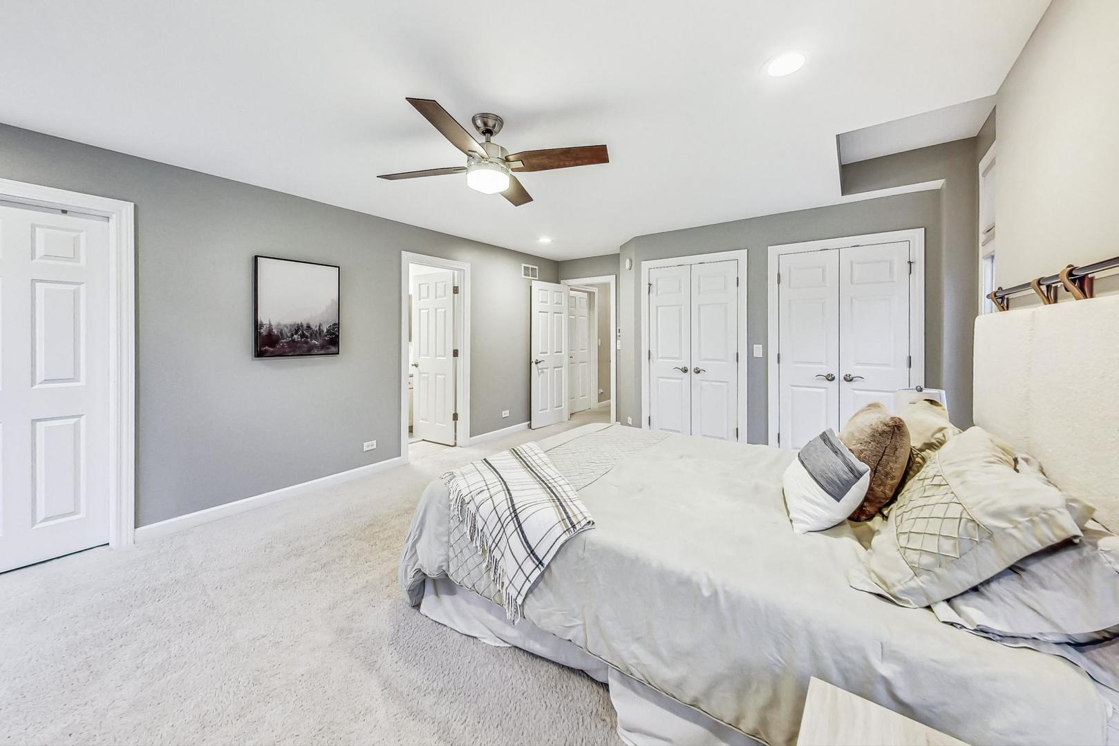 2680 Summit Drive Glenview, IL 60025 - Photo 40 of 70 a bedroom with a bed and a window