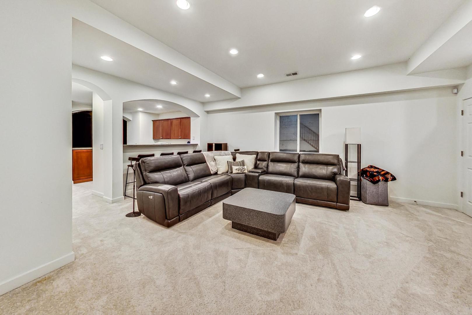 2680 Summit Drive Glenview, IL 60025 - Photo 47 of 70 a living room with furniture and a couch