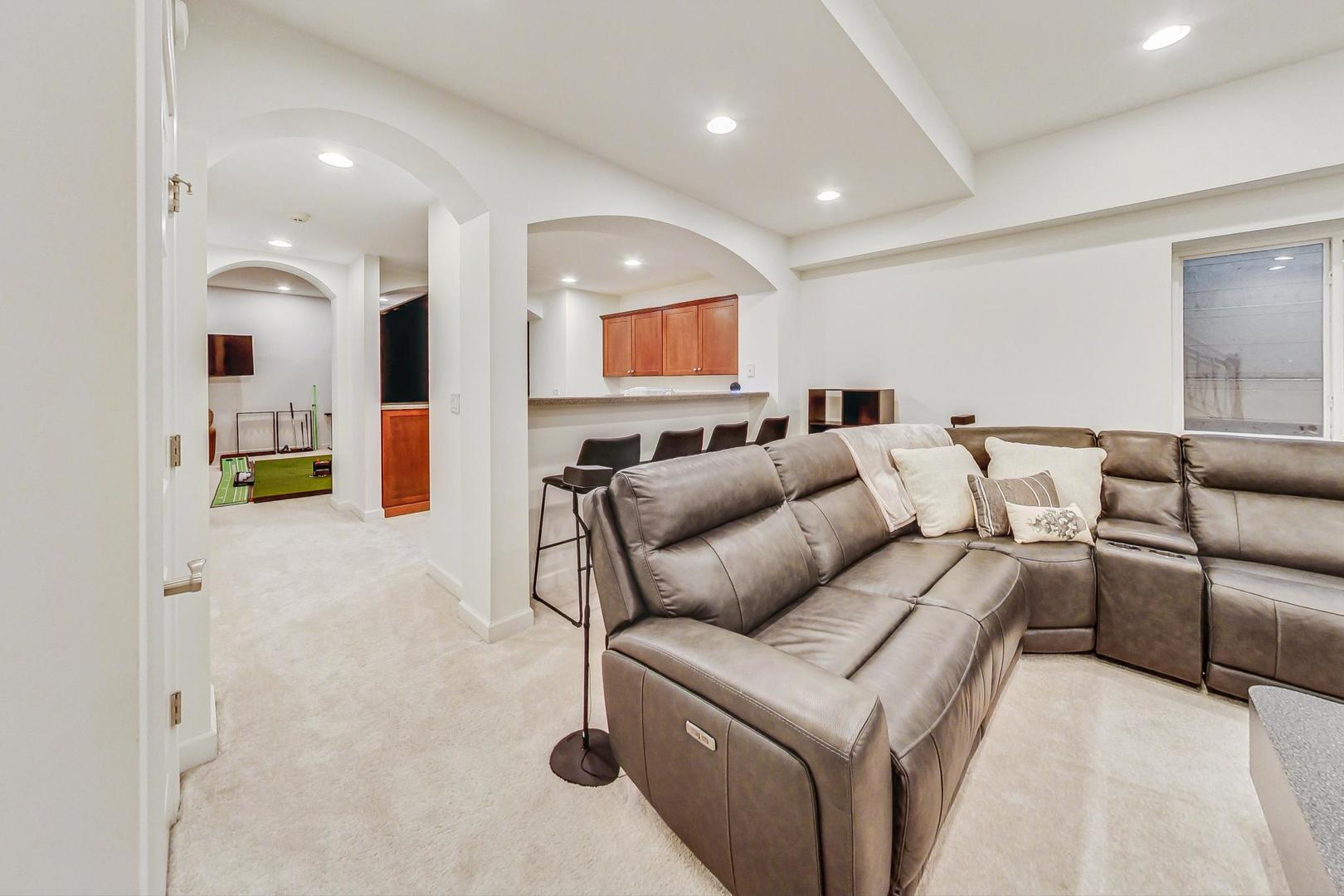 2680 Summit Drive Glenview, IL 60025 - Photo 49 of 70 a living room with furniture and a wooden floor