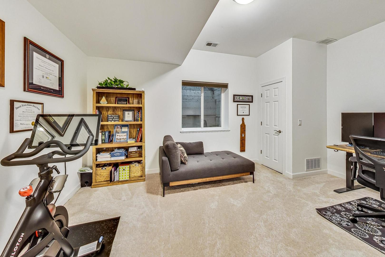 2680 Summit Drive Glenview, IL 60025 - Photo 58 of 70 a bedroom with furniture and a gym equipment