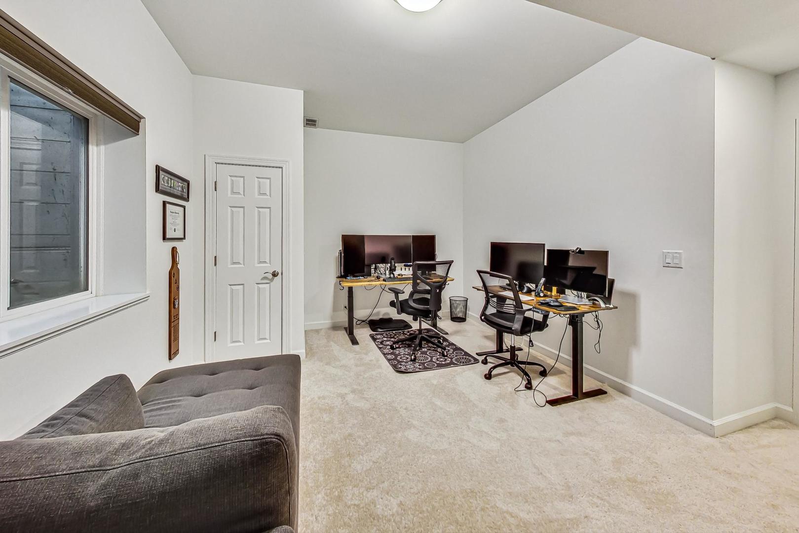 2680 Summit Drive Glenview, IL 60025 - Photo 59 of 70 a livingroom with workspace and a couch