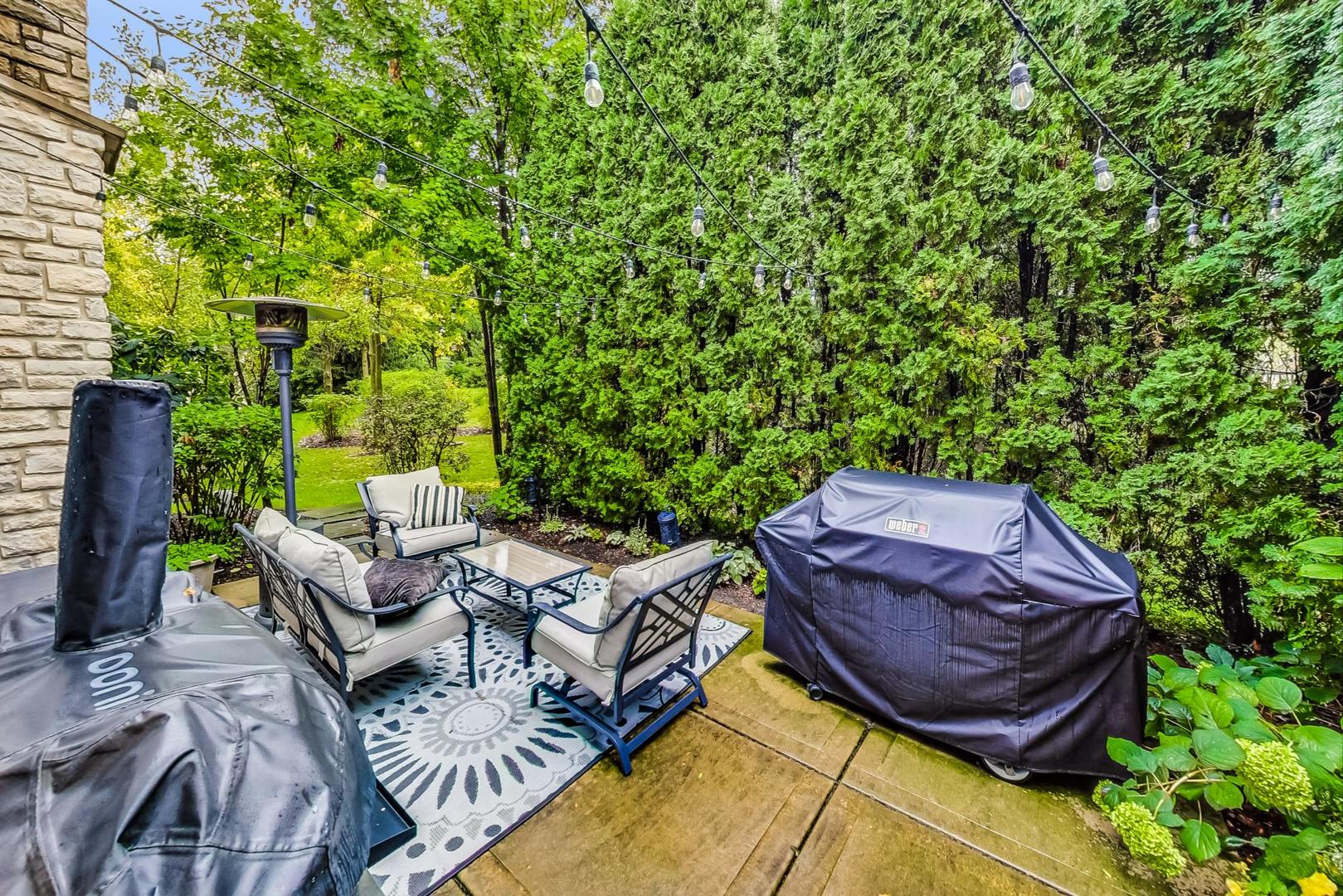 2680 Summit Drive Glenview, IL 60025 - Photo 62 of 70 a view of an outdoor sitting area in a backyard