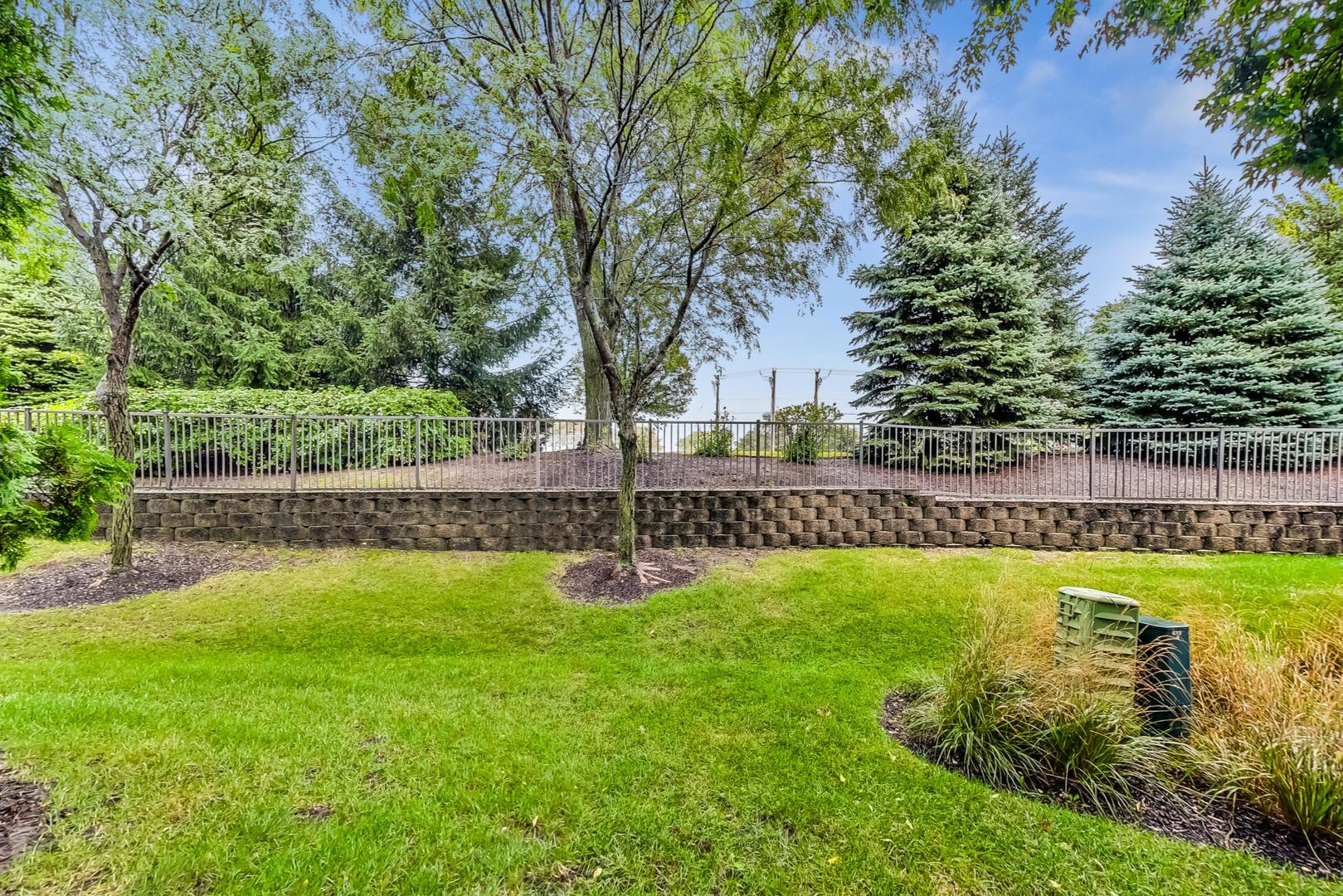 2680 Summit Drive Glenview, IL 60025 - Photo 63 of 70 a view of a back yard with a patio