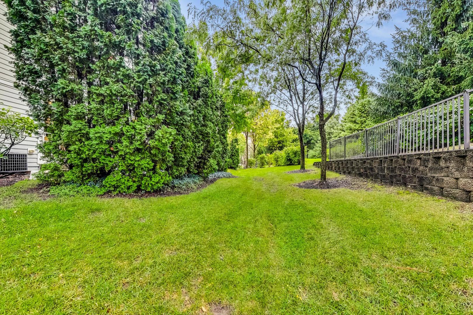 2680 Summit Drive Glenview, IL 60025 - Photo 64 of 70 a view of a yard with a tree