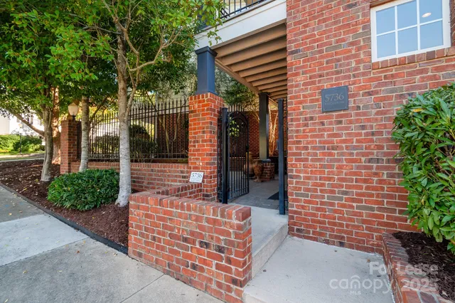 a backyard of a house with seating space