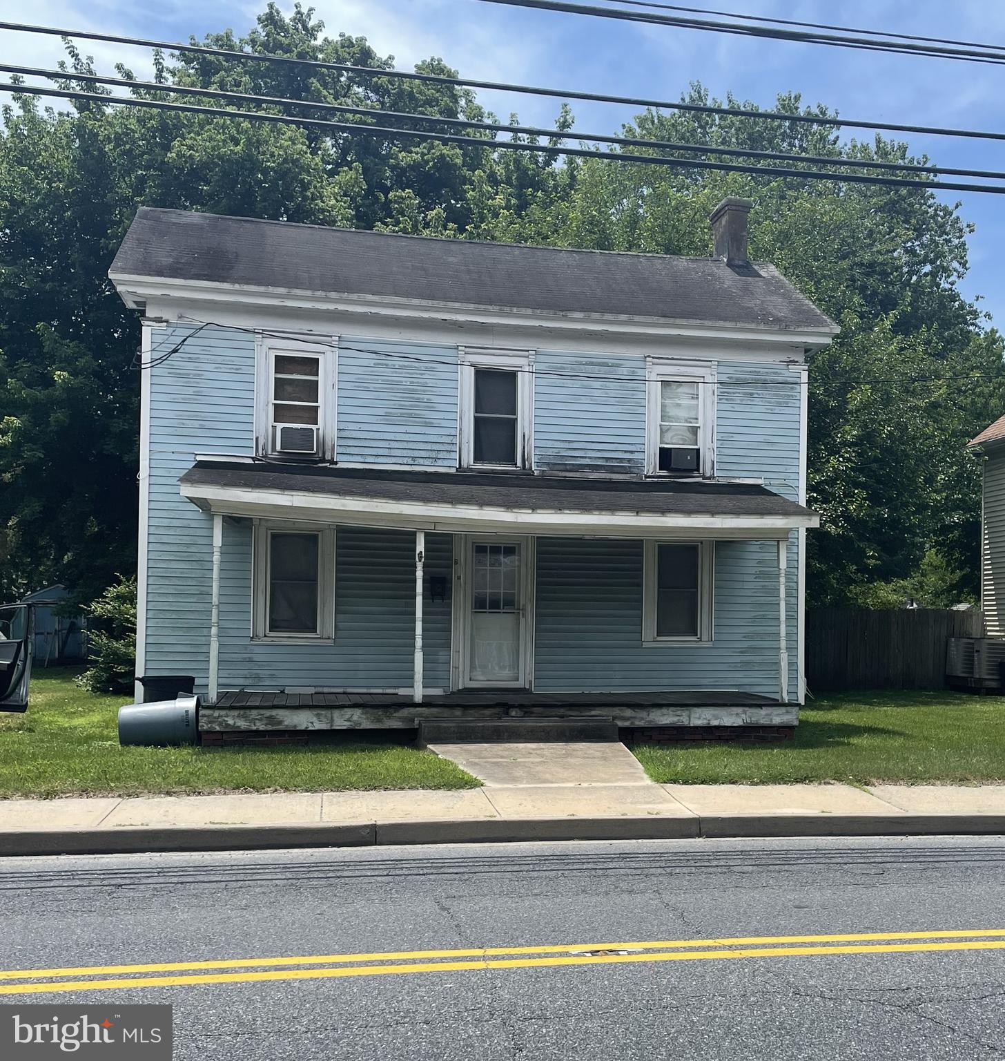 6 West State Street Delmar, MD 21875 - Photo 2 of 10 a view of a house with a swimming pool