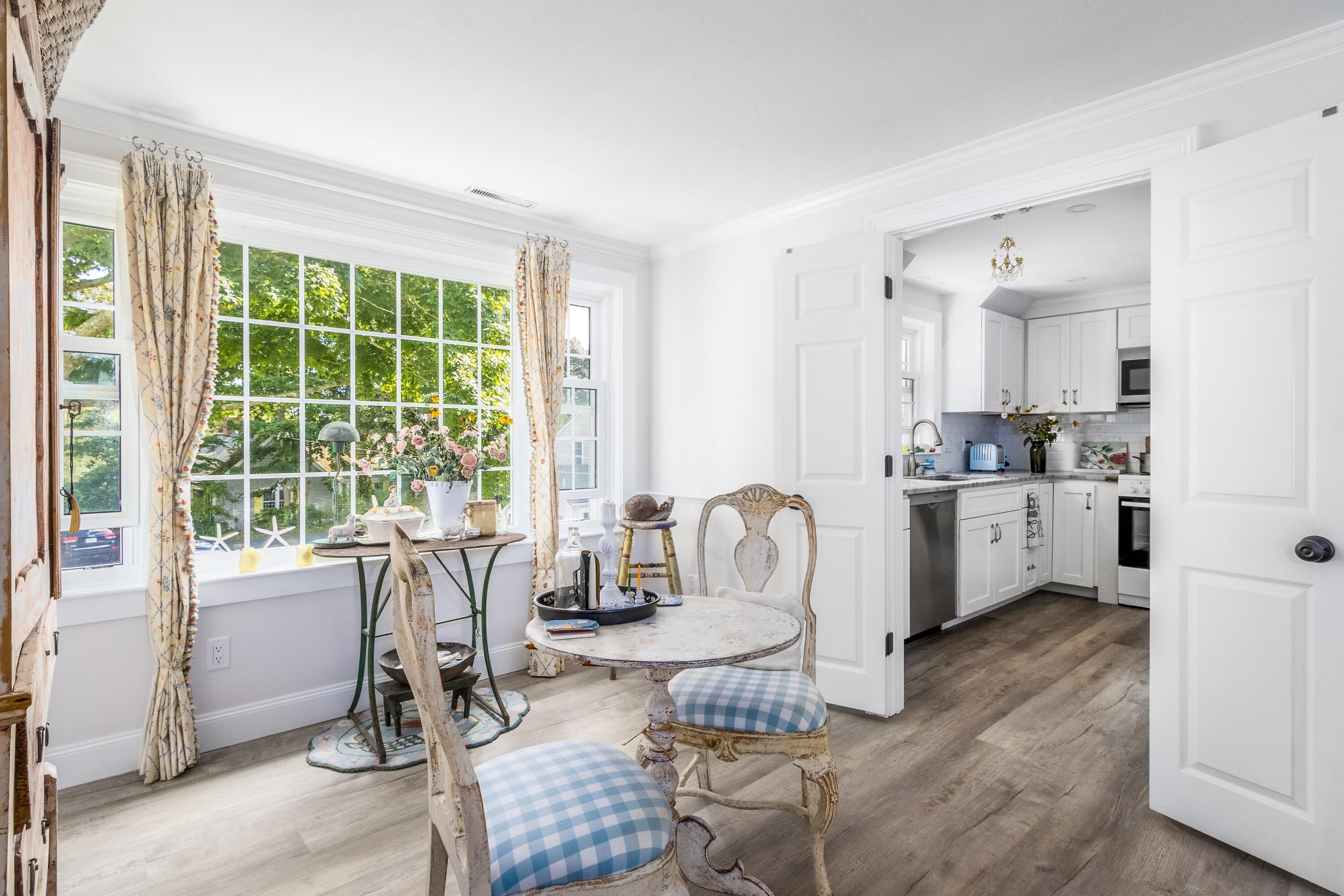 920 Main Street, Unit 4 Osterville, MA 02655 - Photo 12 of 28 a view of a kitchen and dining room