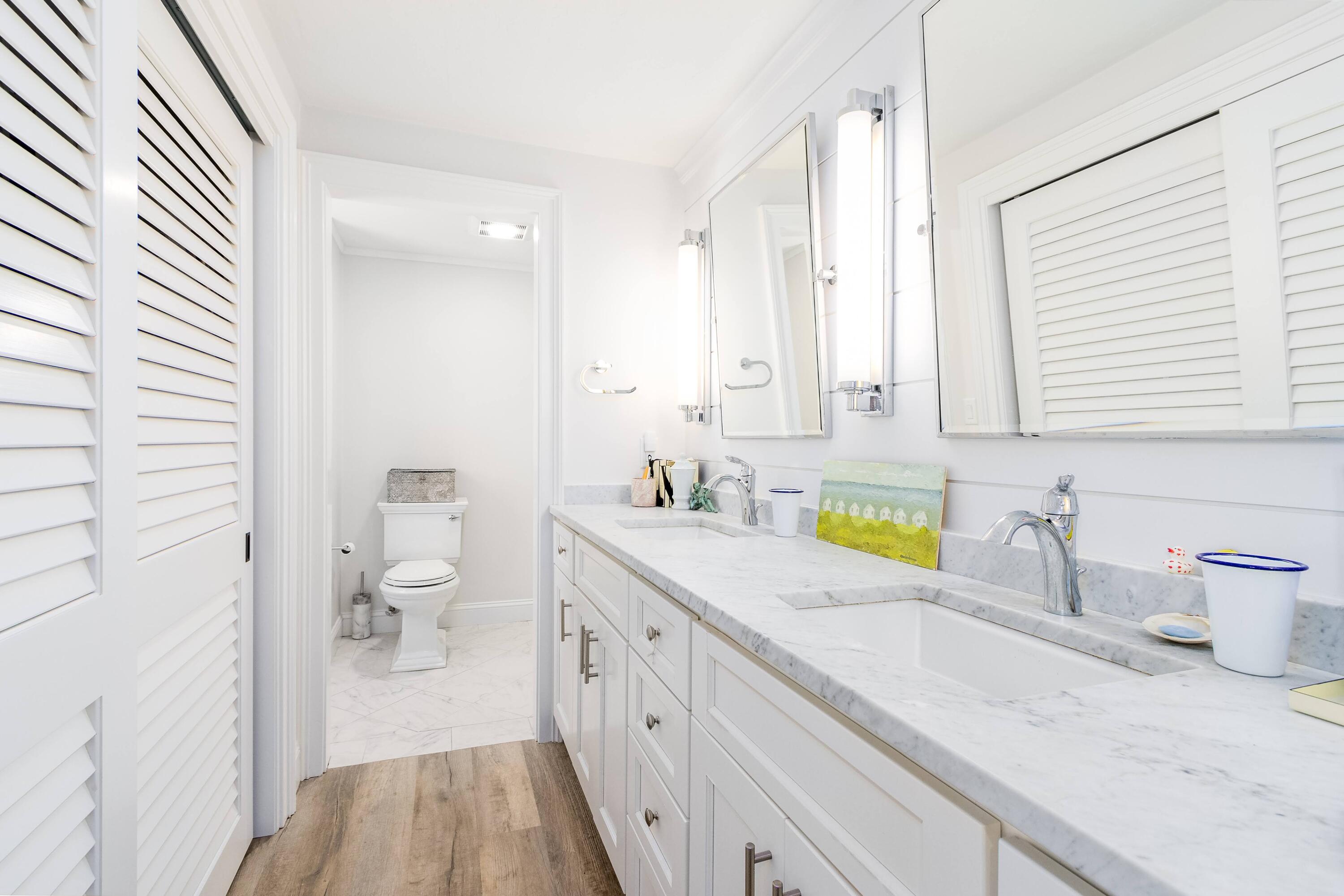 920 Main Street, Unit 4 Osterville, MA 02655 - Photo 21 of 28 a spacious bathroom with a granite countertop sink and a bathtub