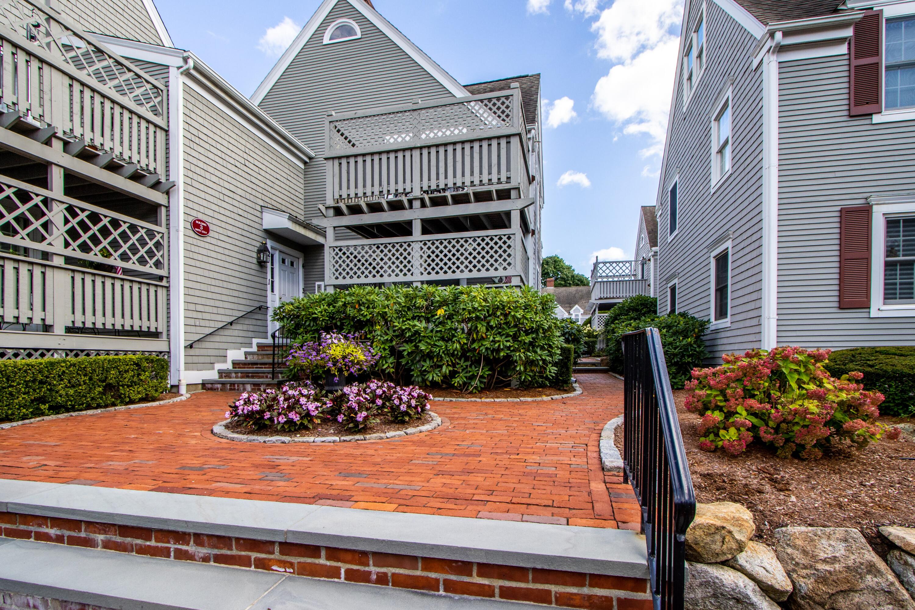 920 Main Street, Unit 4 Osterville, MA 02655 - Photo 28 of 28 a view of a house with a yard