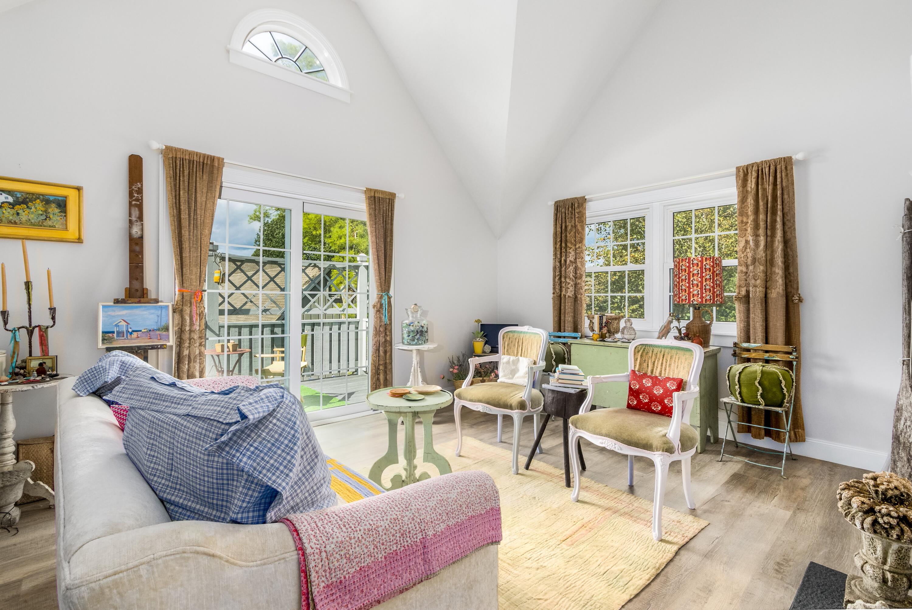 920 Main Street, Unit 4 Osterville, MA 02655 - Photo 5 of 28 a living room with furniture and a large window