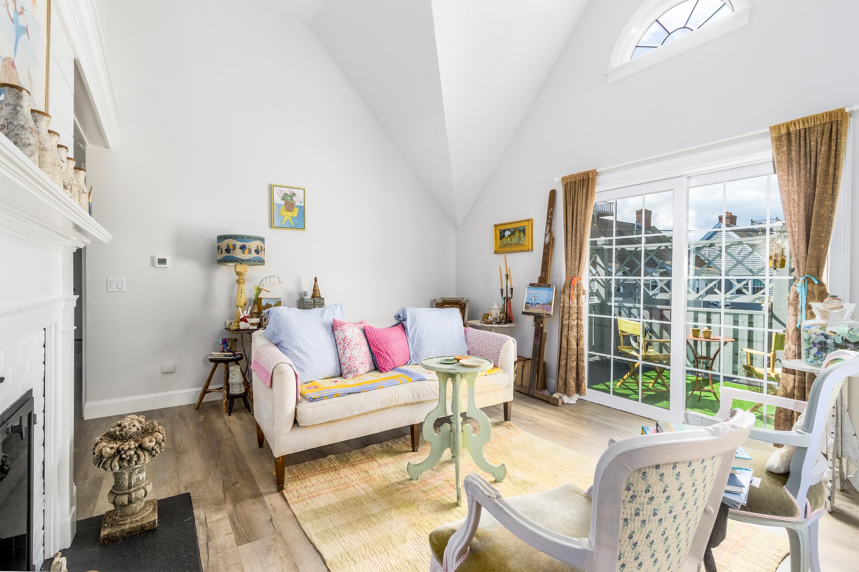 920 Main Street, Unit 4 Osterville, MA 02655 - Photo 6 of 28 a living room with furniture and a large window