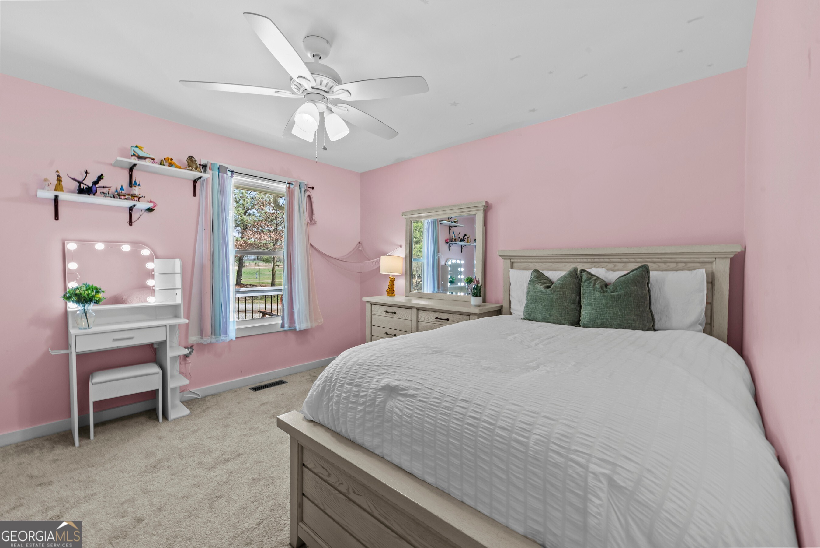 1687 Leon Ellis Road Hull, GA 30646 - Photo 14 of 51 a spacious bedroom with a bed and a window