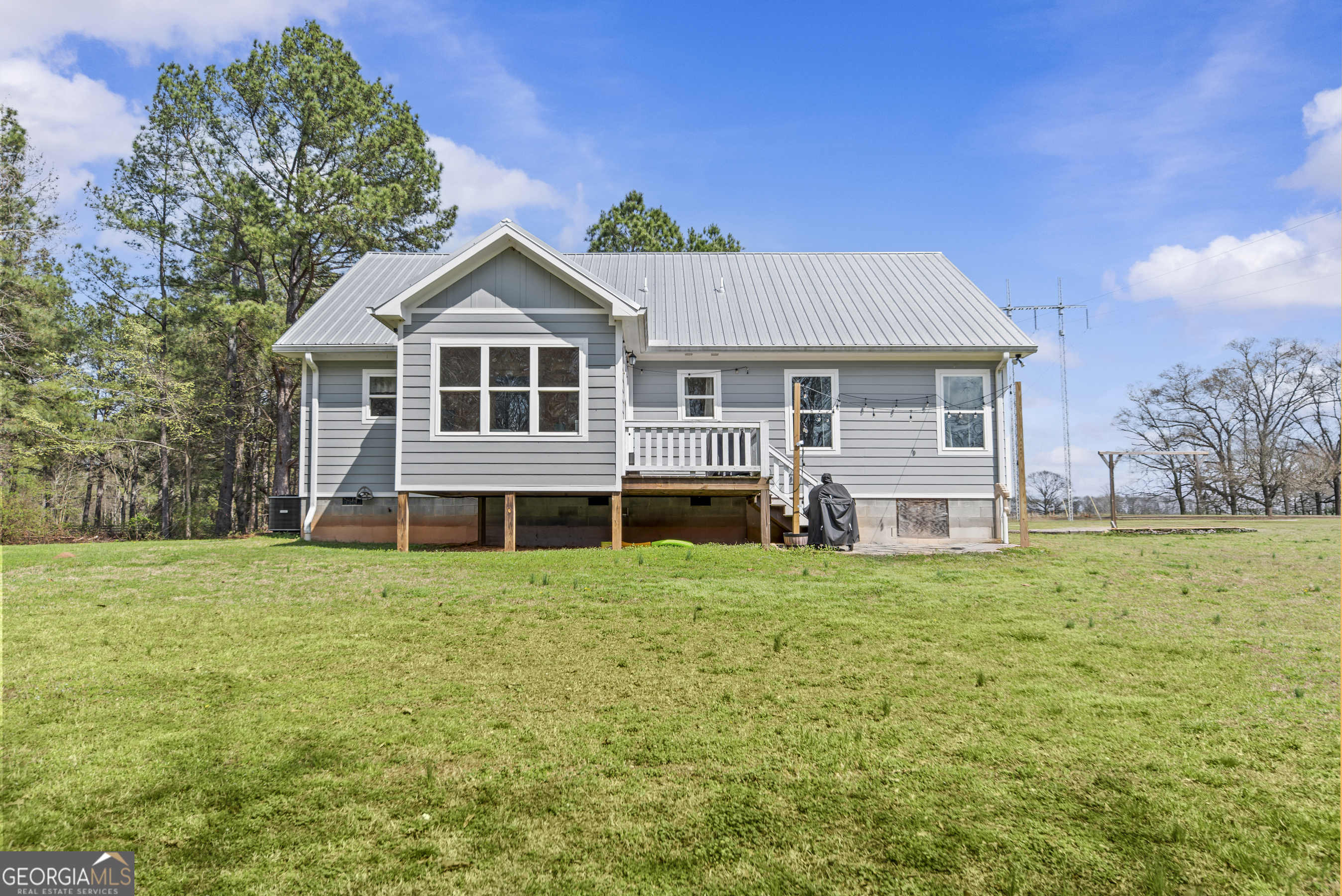 1687 Leon Ellis Road Hull, GA 30646 - Photo 19 of 51 a house view with a garden space