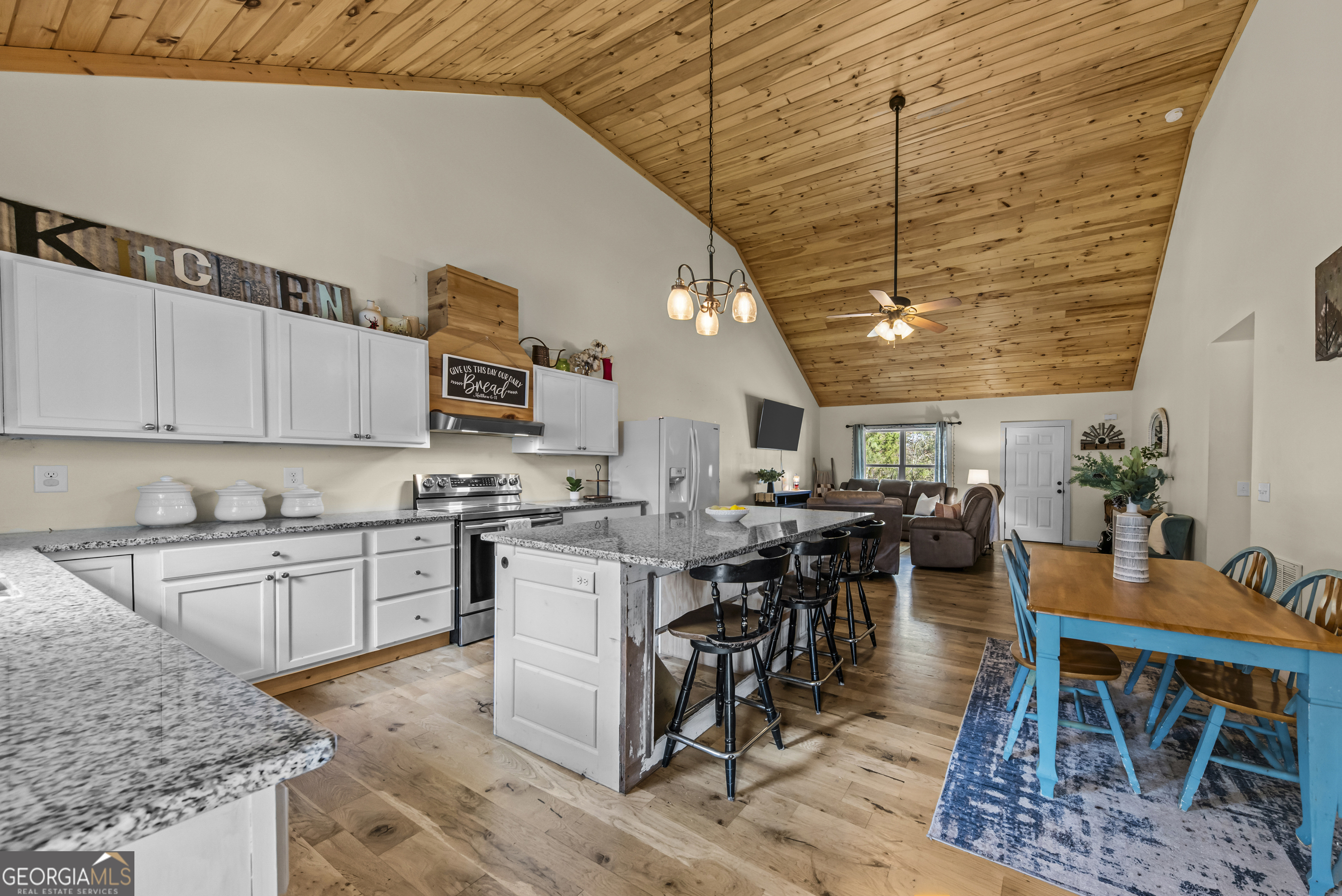 1687 Leon Ellis Road Hull, GA 30646 - Photo 25 of 51 a kitchen with lots of wooden furniture appliances and cabinets
