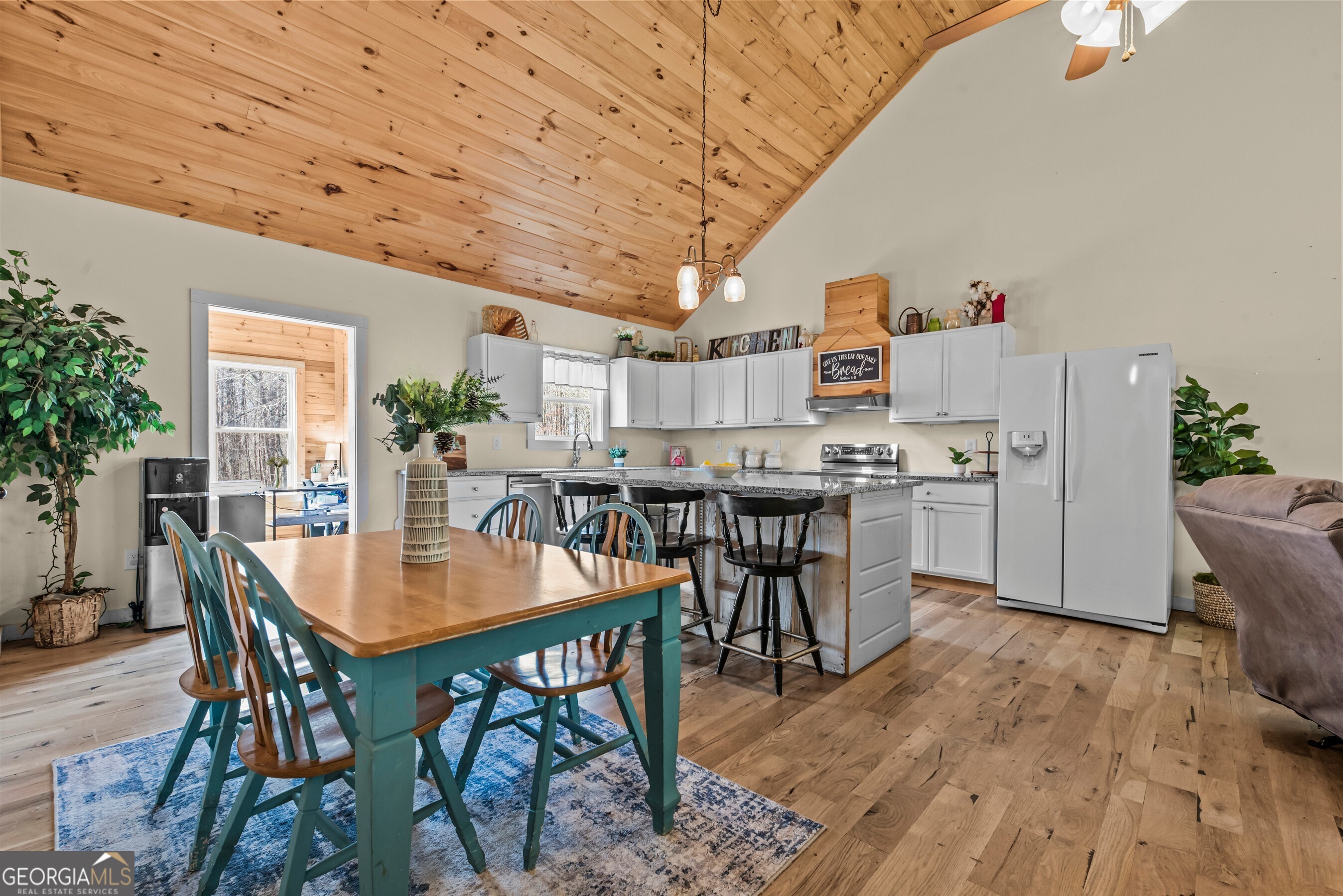 1687 Leon Ellis Road Hull, GA 30646 - Photo 27 of 51 a dining room with furniture and window