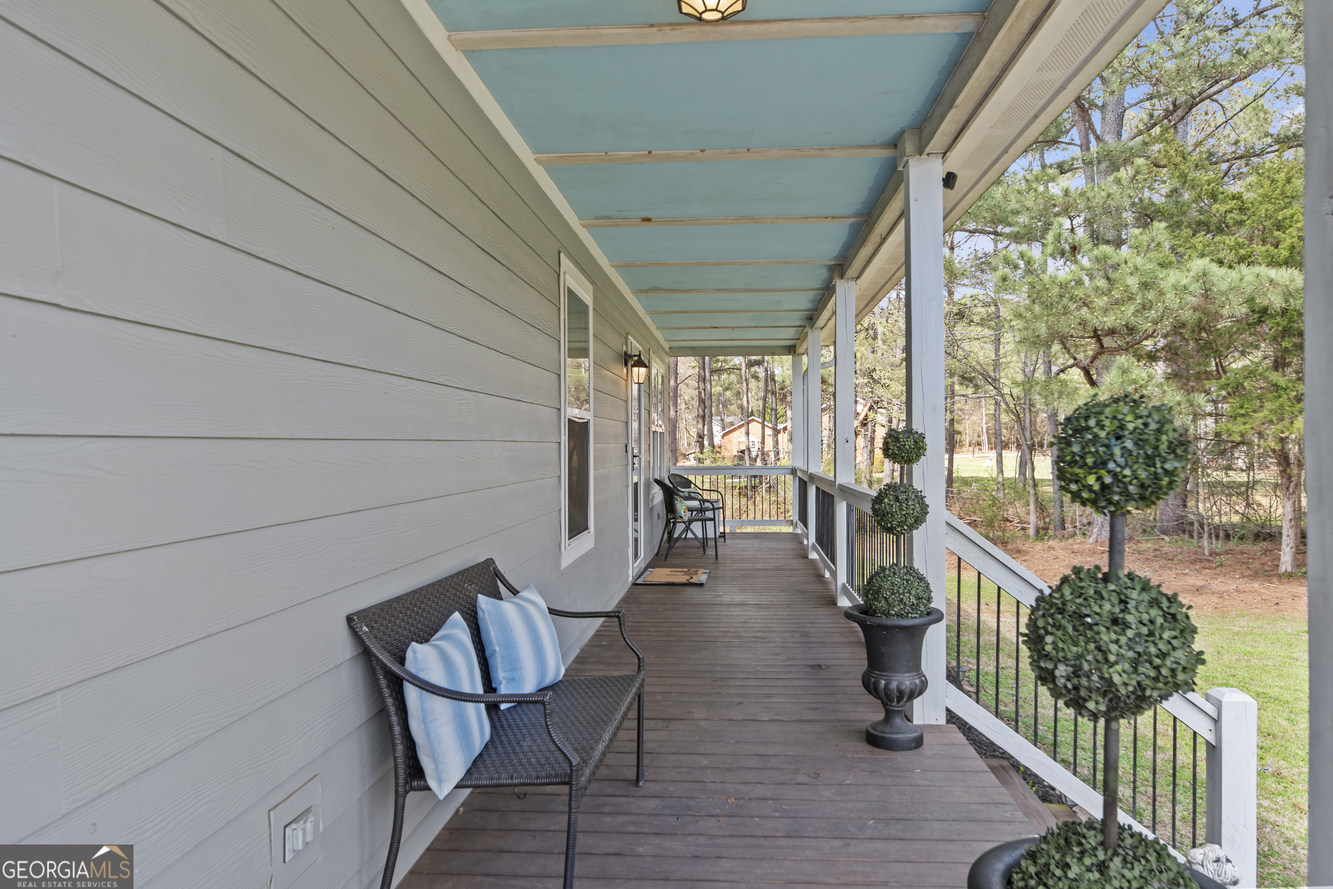1687 Leon Ellis Road Hull, GA 30646 - Photo 3 of 51 a view of a chairs and table in the balcony