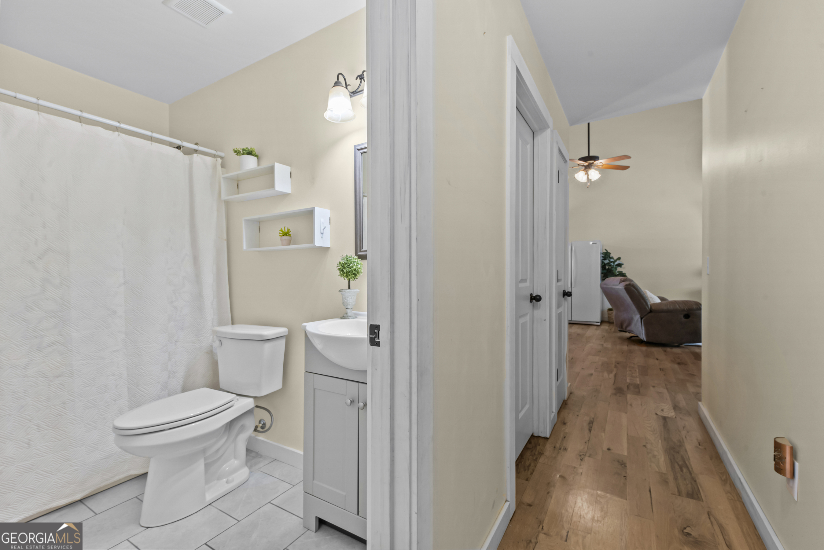 1687 Leon Ellis Road Hull, GA 30646 - Photo 32 of 51 a bathroom with a granite countertop toilet a sink and view
