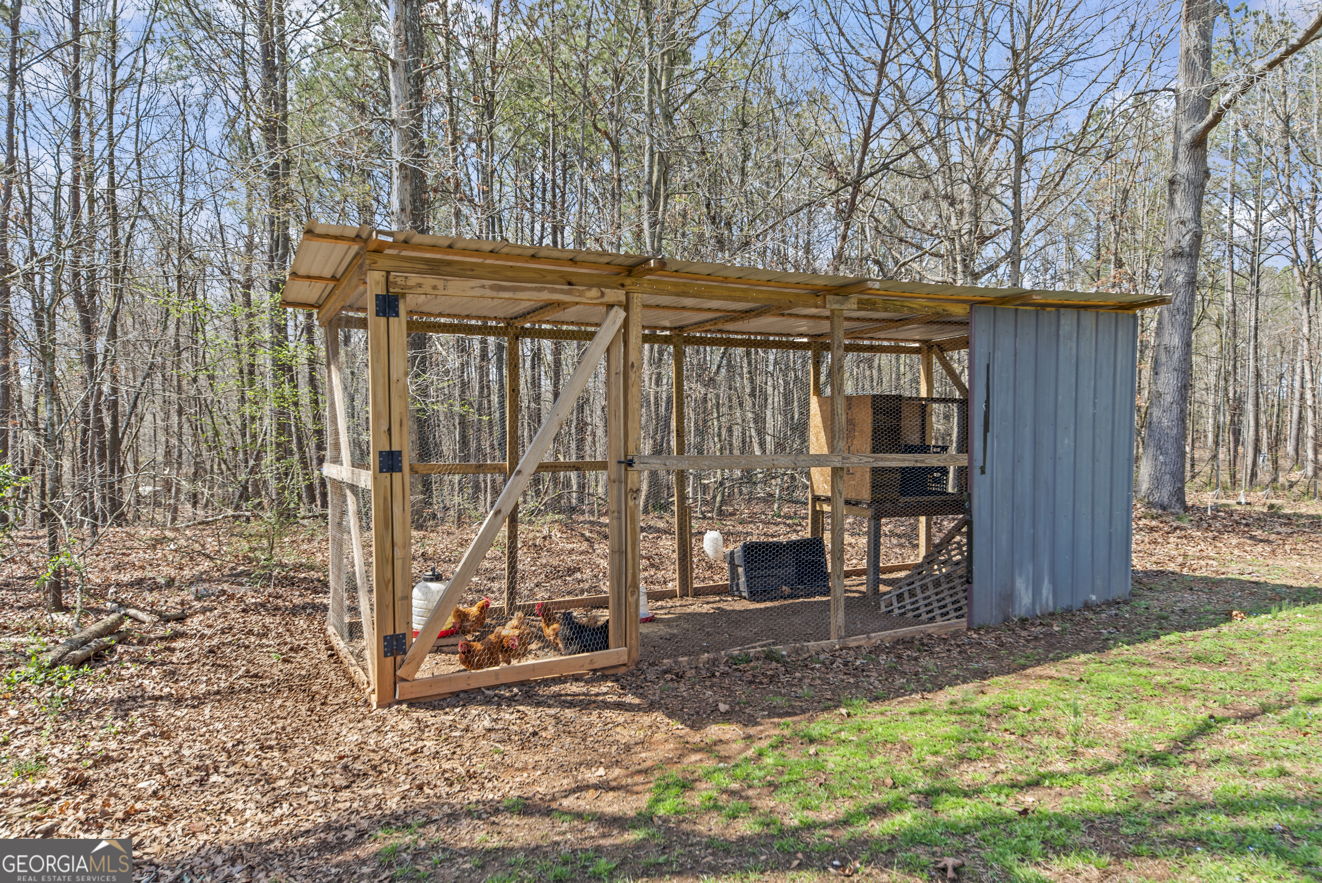 1687 Leon Ellis Road Hull, GA 30646 - Photo 37 of 51 a backyard of a house with barbeque oven