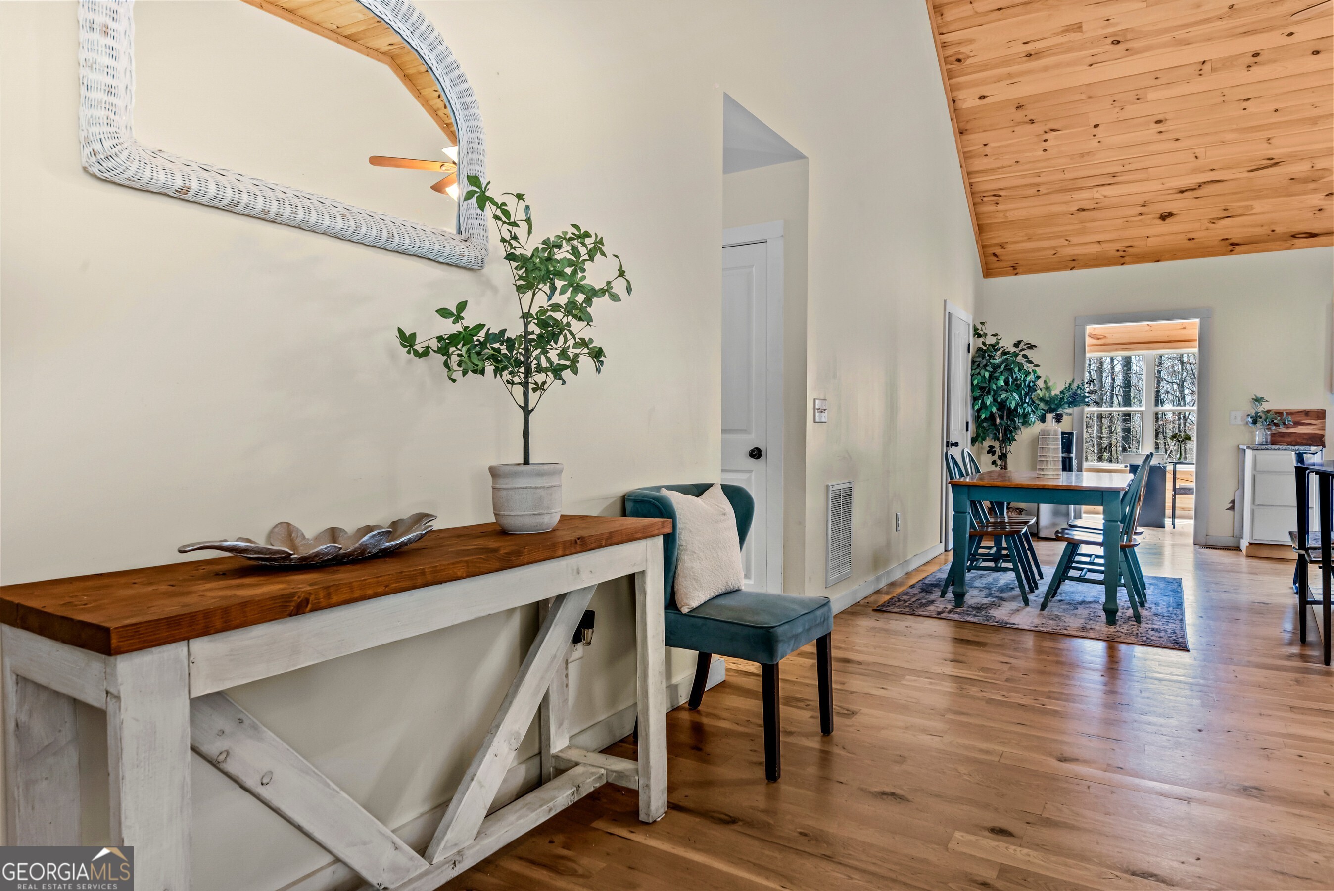 1687 Leon Ellis Road Hull, GA 30646 - Photo 4 of 51 a dining room with furniture and wooden floor