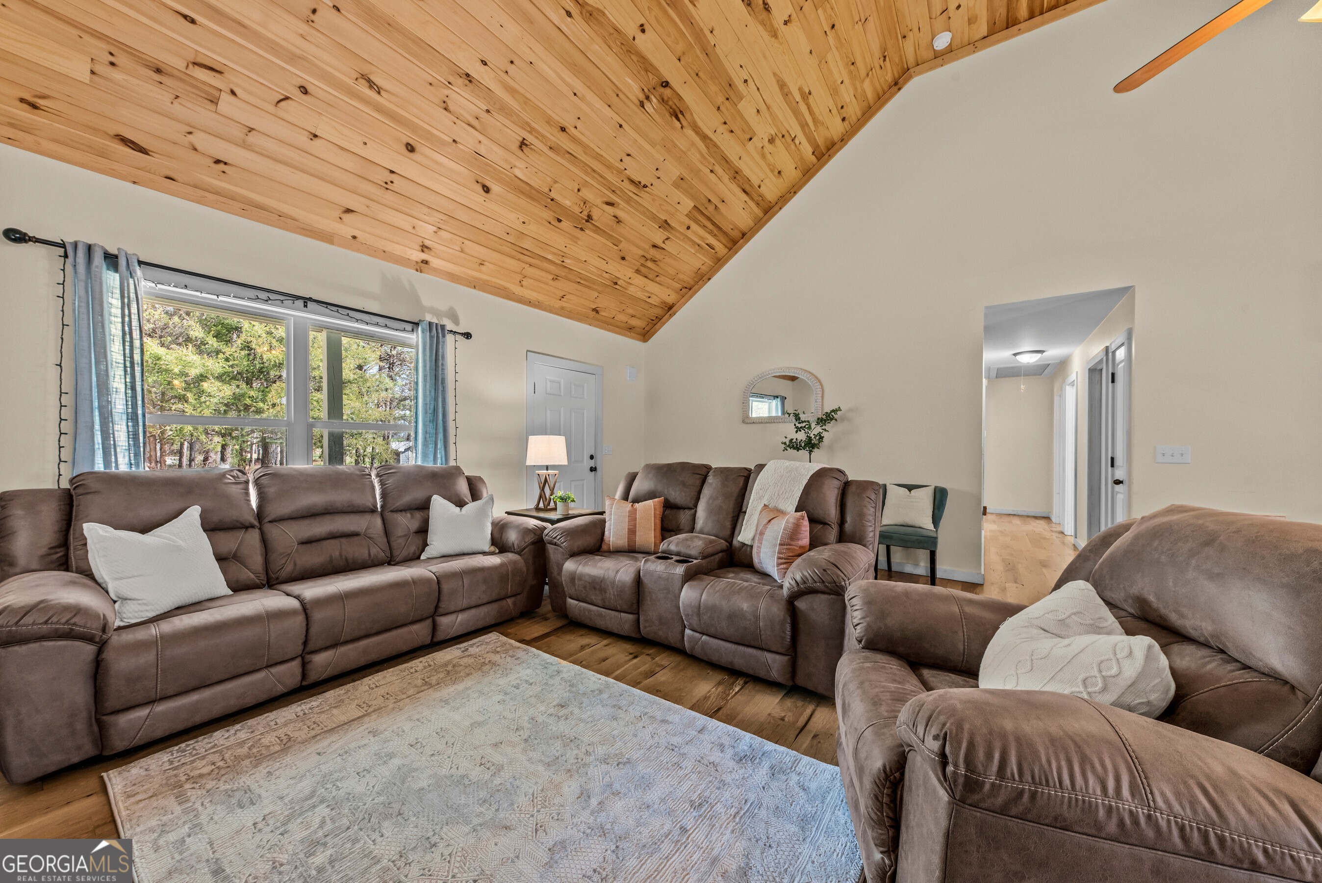 1687 Leon Ellis Road Hull, GA 30646 - Photo 5 of 51 a living room with furniture a couch and a large window