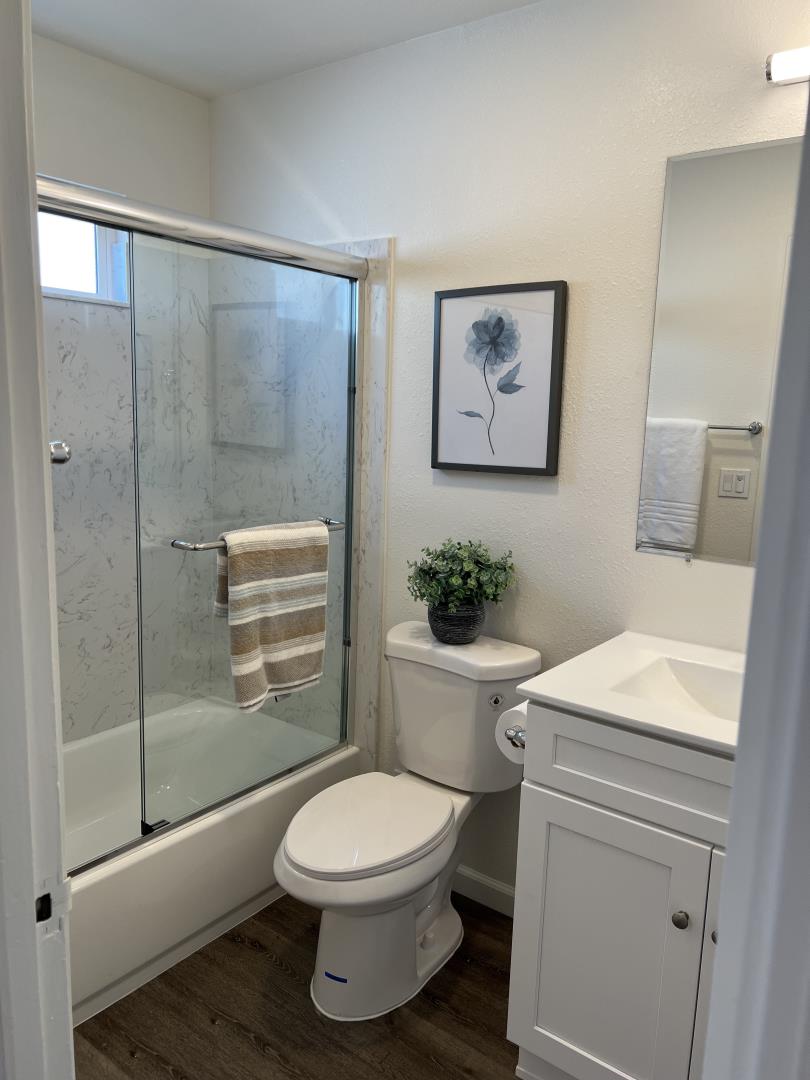 1311 Lexington Road Concord, CA 94520 - Photo 16 of 25 a bathroom with a toilet sink and shower