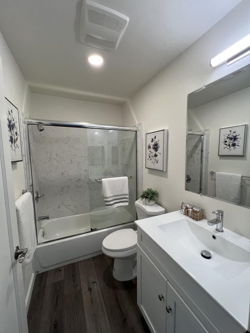 1311 Lexington Road Concord, CA 94520 - Photo 19 of 25 a bathroom with a sink a toilet and shower