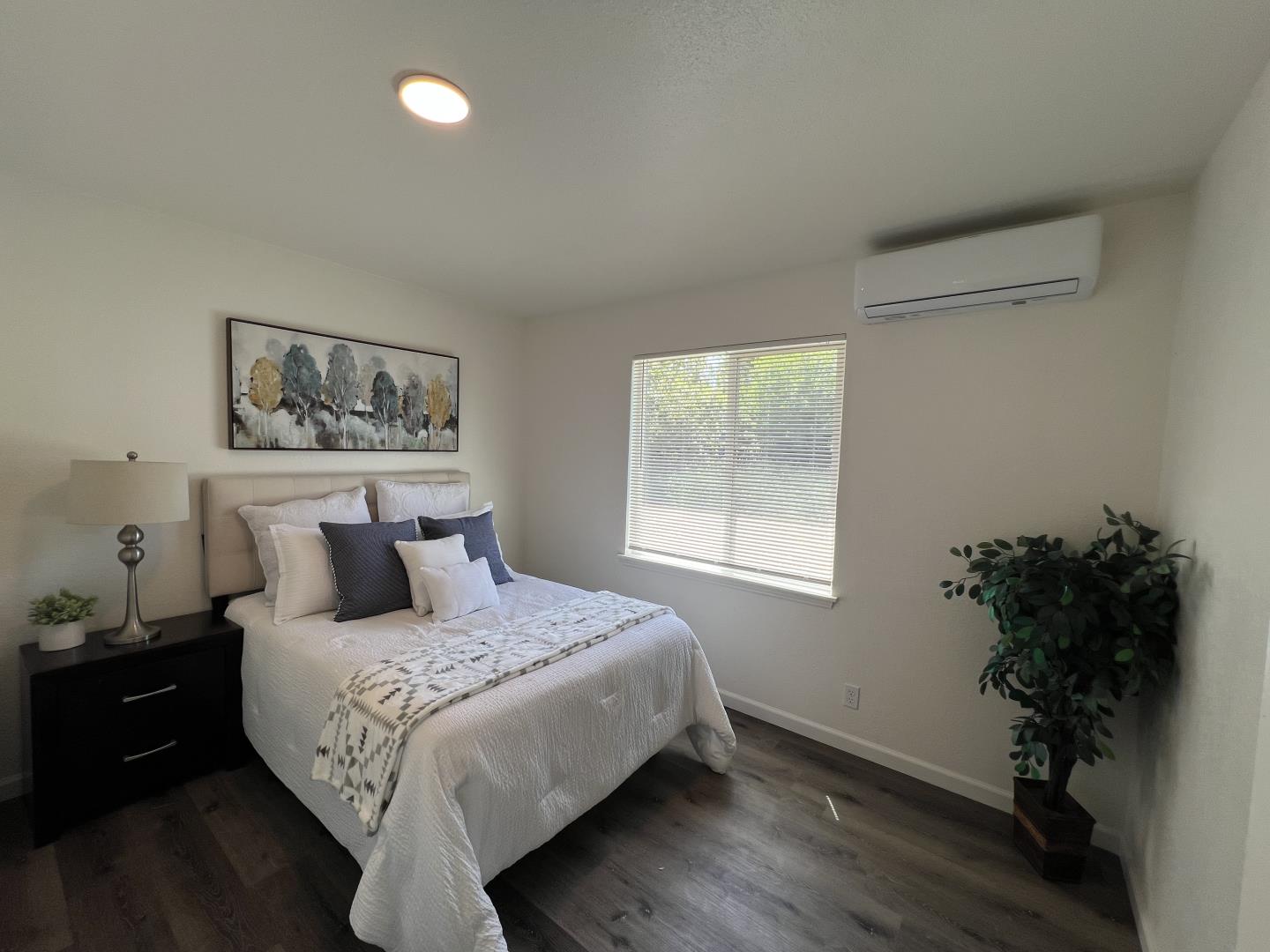 1311 Lexington Road Concord, CA 94520 - Photo 20 of 25 a large bed sitting in a bedroom next to a window
