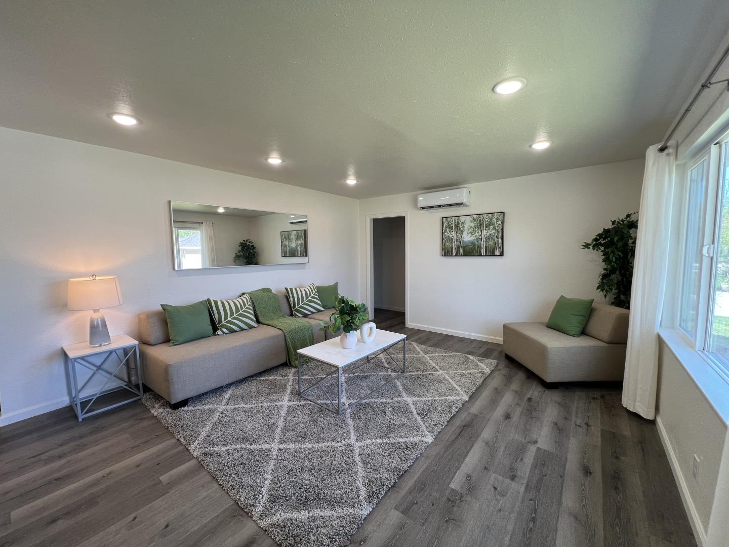1311 Lexington Road Concord, CA 94520 - Photo 2 of 25 a living room with furniture and a couch
