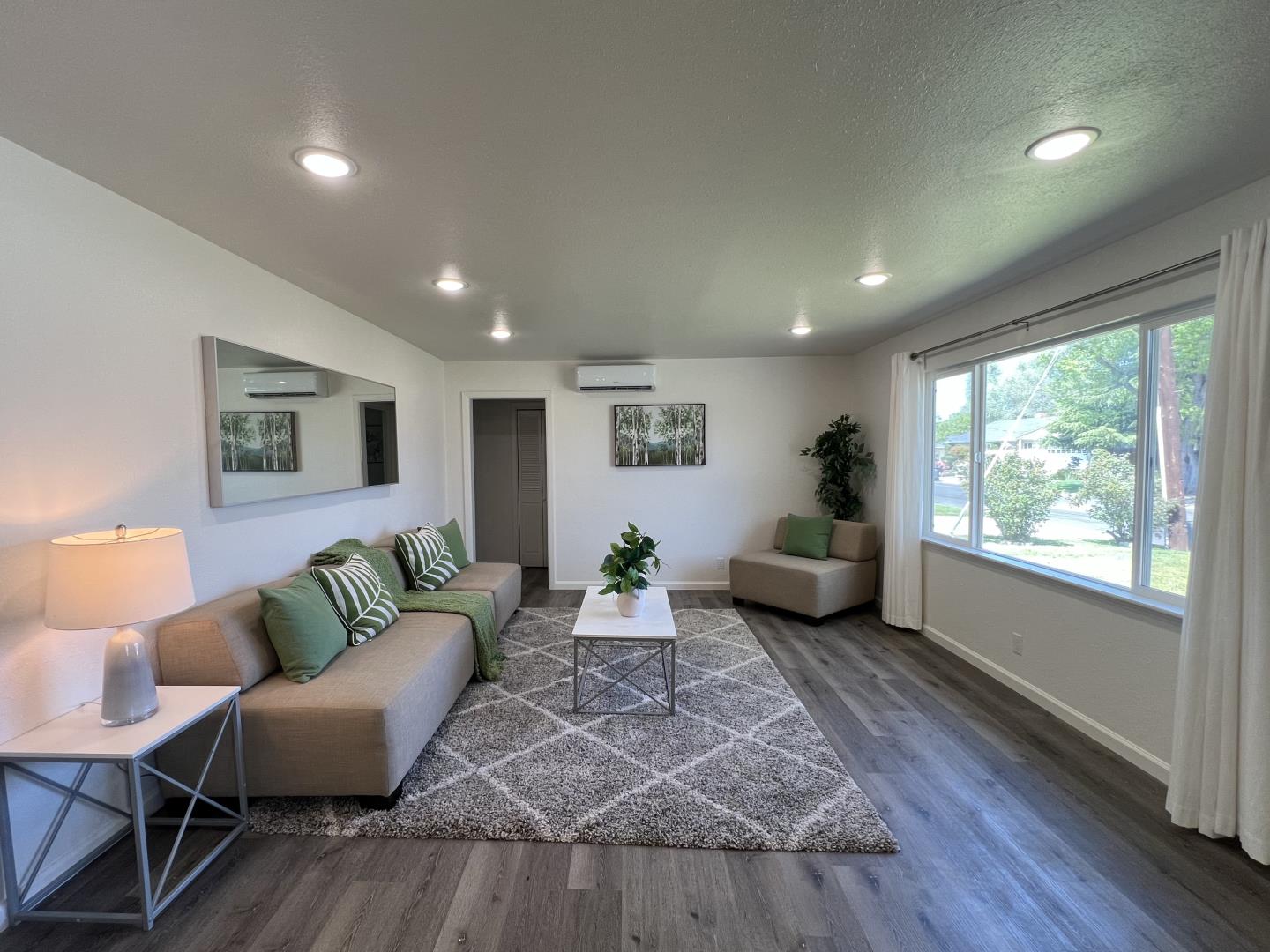 1311 Lexington Road Concord, CA 94520 - Photo 3 of 25 a living room with furniture and wooden floor