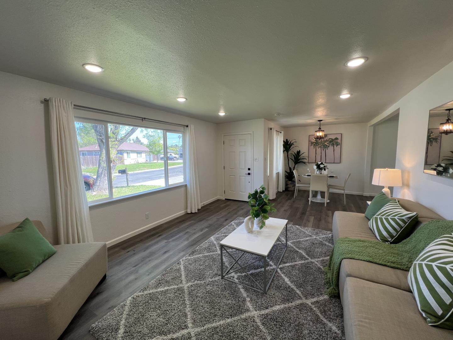 1311 Lexington Road Concord, CA 94520 - Photo 4 of 25 a living room with furniture and a large window