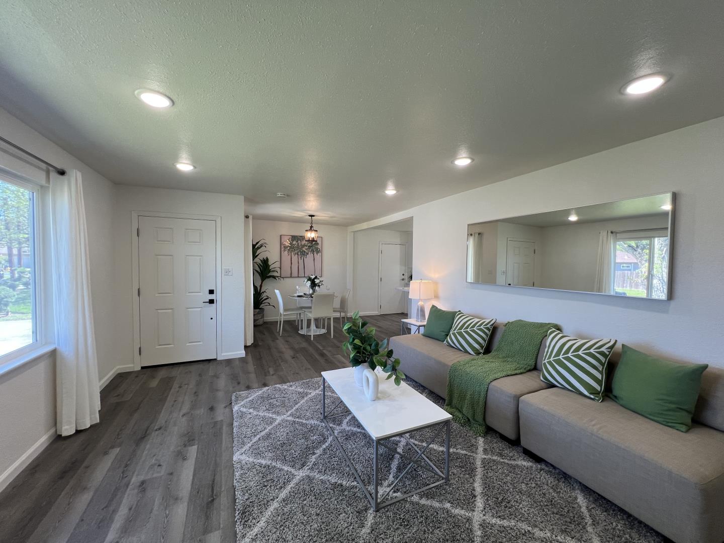 1311 Lexington Road Concord, CA 94520 - Photo 5 of 25 a living room with furniture and wooden floor