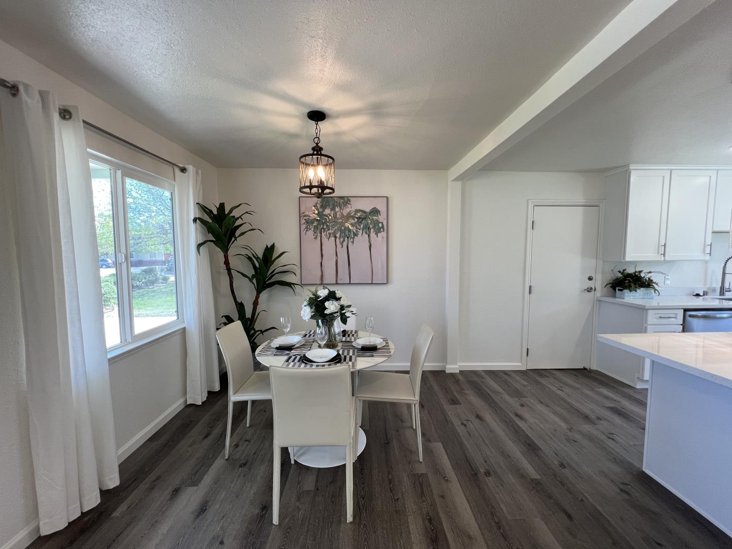 1311 Lexington Road Concord, CA 94520 - Photo 6 of 25 a view of a dining room with furniture window and wooden floor
