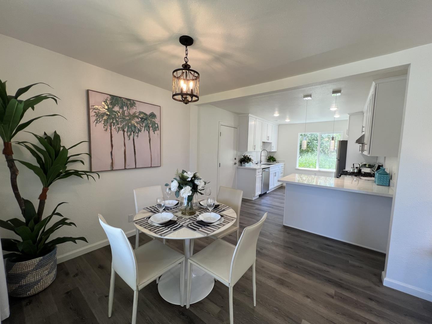 1311 Lexington Road Concord, CA 94520 - Photo 8 of 25 a view of a dining room with furniture window and wooden floor