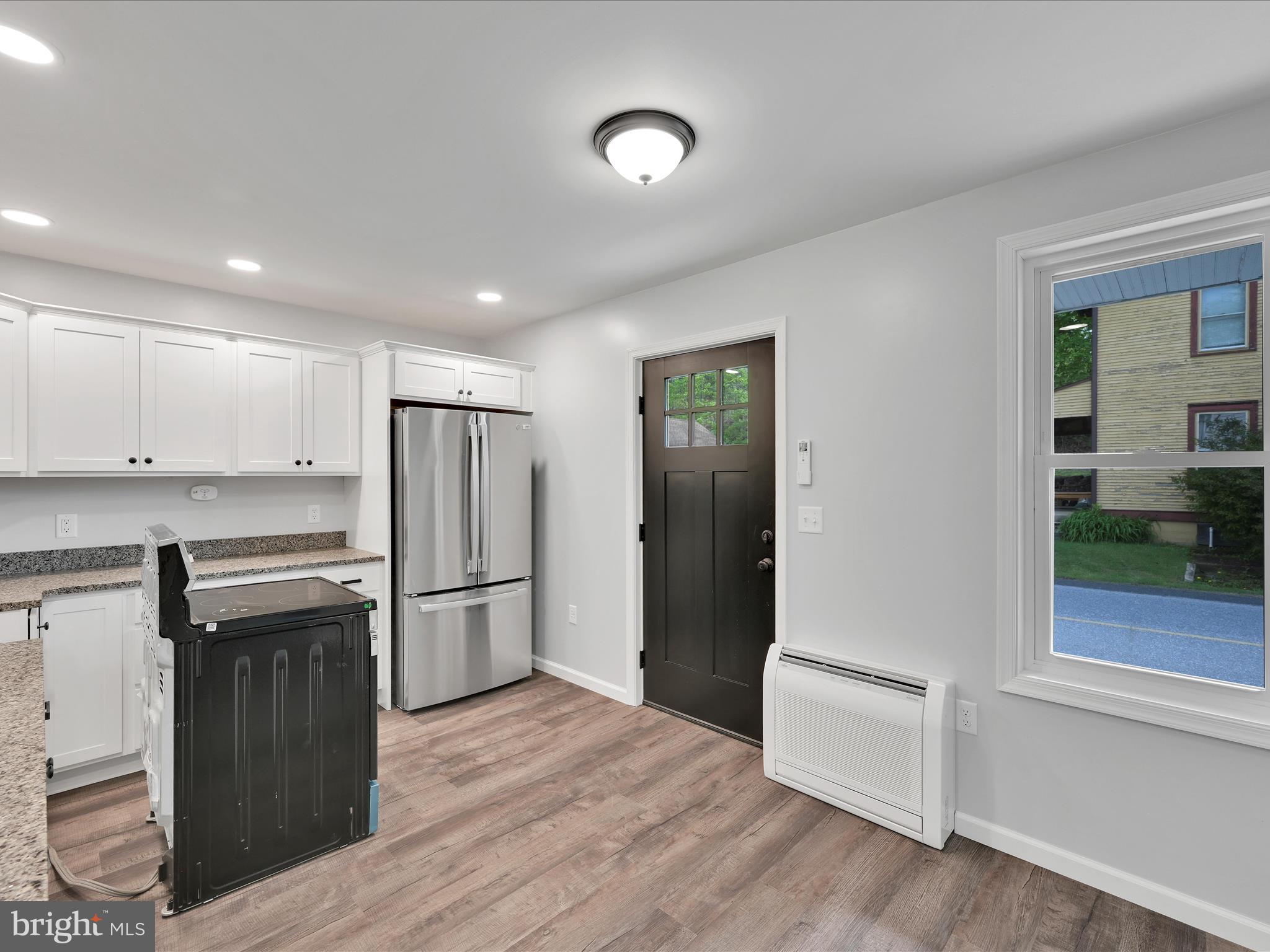 2 Suedberg Road Pine Grove, PA 17963 - Photo 11 of 22 a kitchen with stainless steel appliances granite countertop a refrigerator and a stove top oven