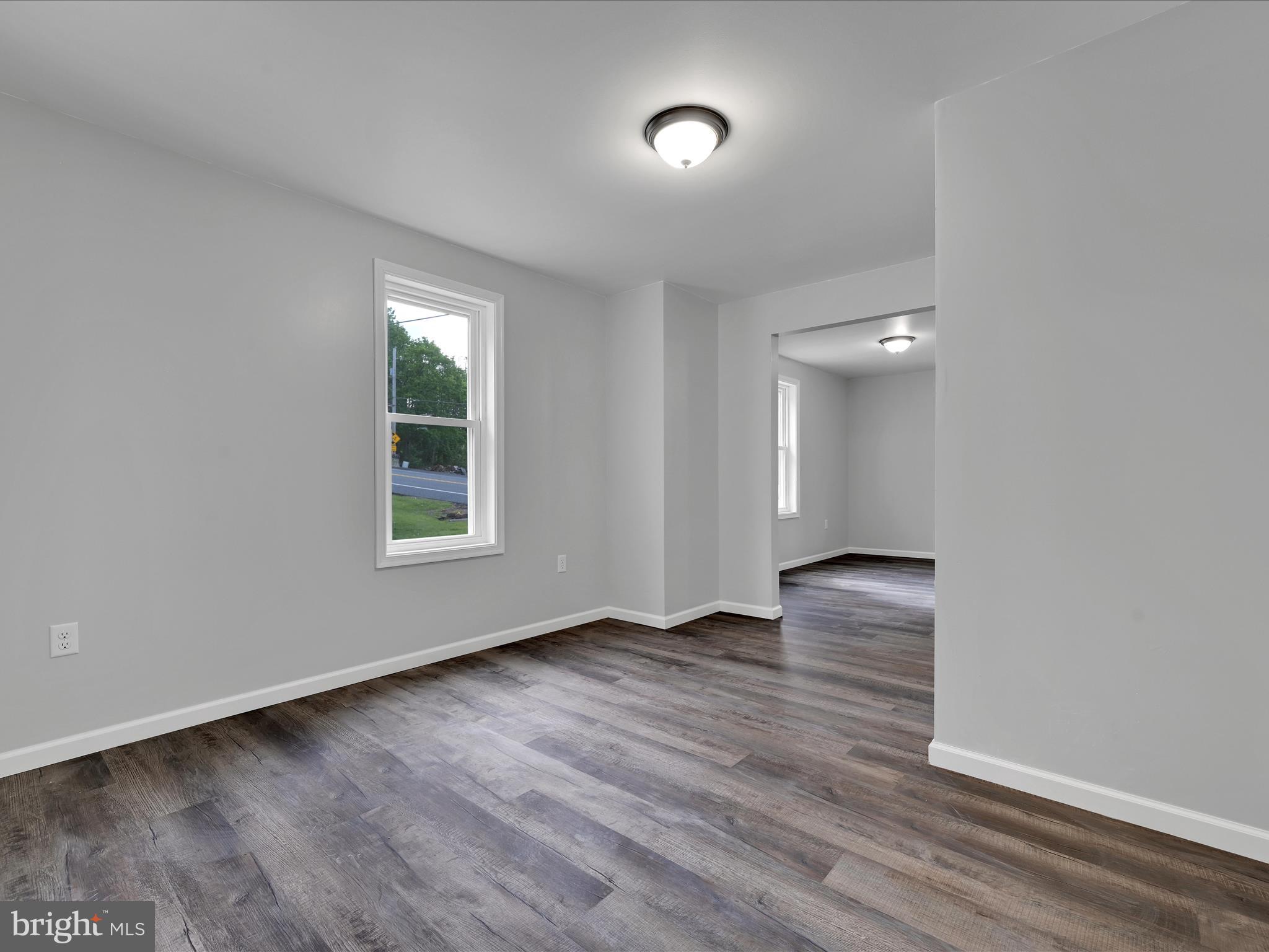 2 Suedberg Road Pine Grove, PA 17963 - Photo 9 of 22 an empty room with wooden floor and windows