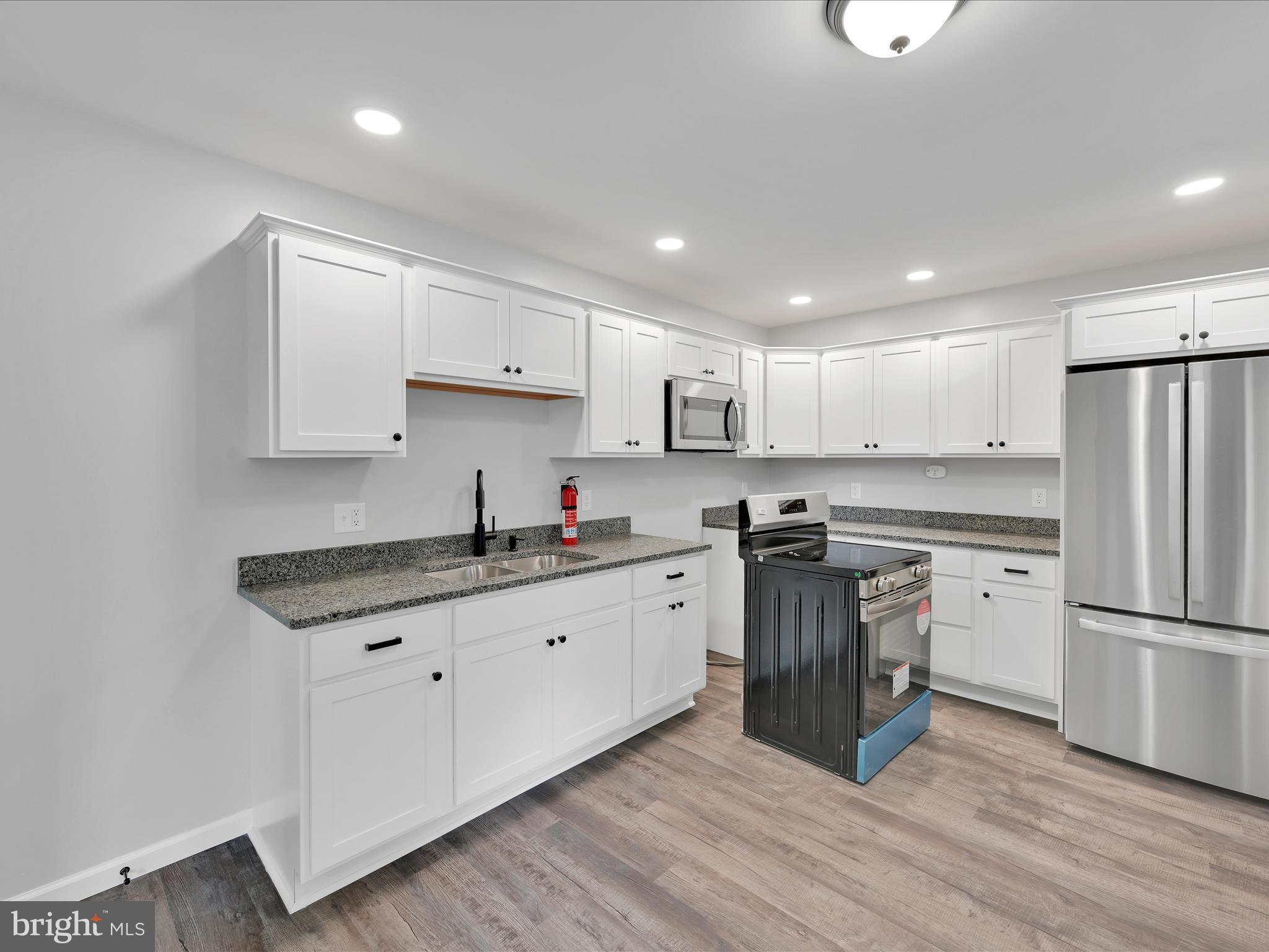 2 Suedberg Road Pine Grove, PA 17963 - Photo 10 of 22 a kitchen with granite countertop a sink stainless steel appliances and cabinets