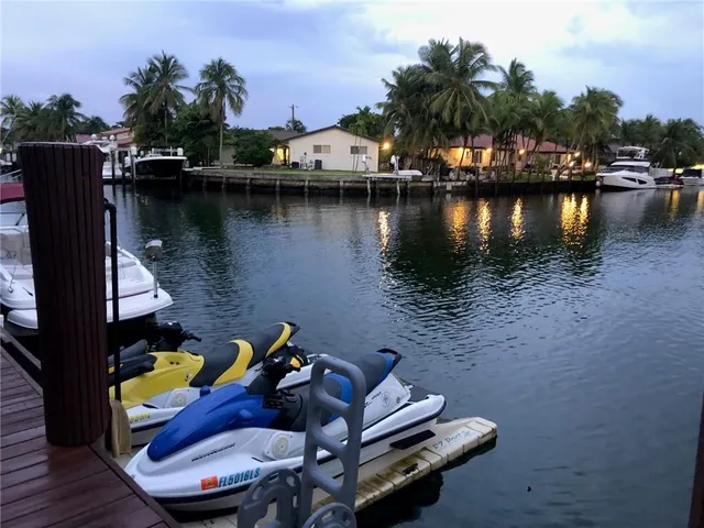 a view of a lake with sitting area