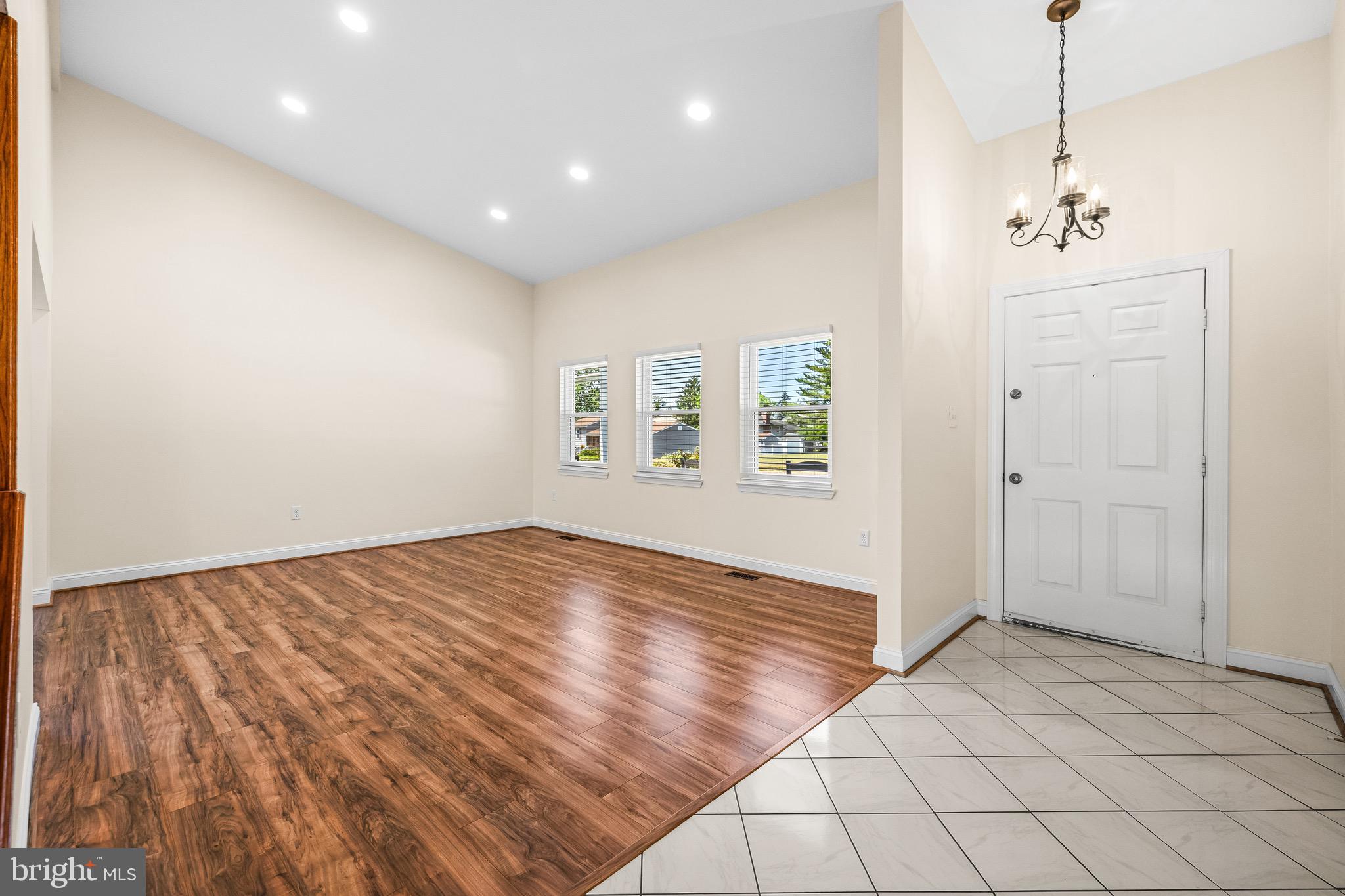 9207 Kilbride Road Nottingham, MD 21236 - Photo 5 of 59 Living room with vaulted ceilings