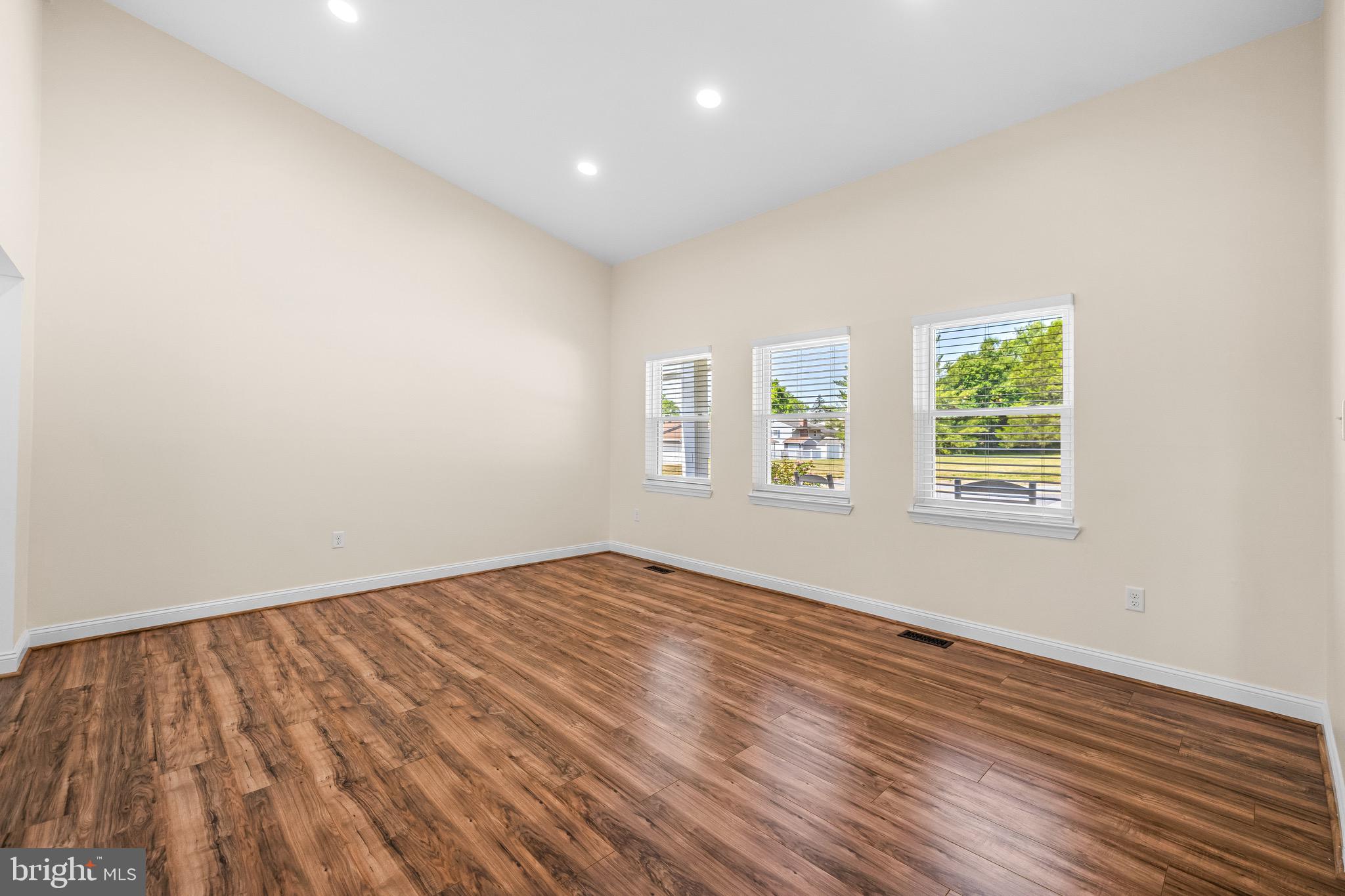 9207 Kilbride Road Nottingham, MD 21236 - Photo 7 of 59 Living room with vaulted ceilings