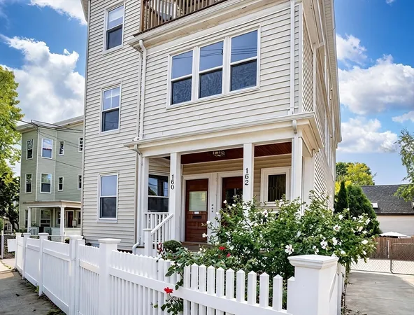 a front view of a house with windows