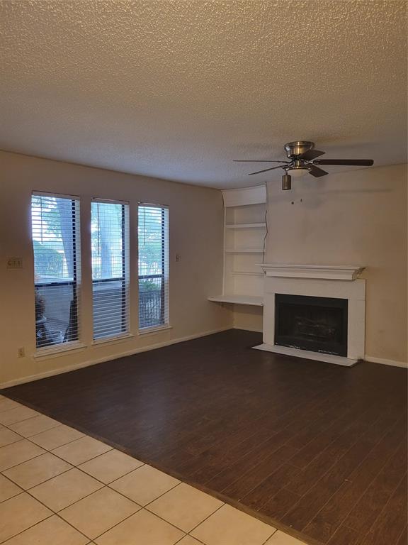 9601 Walnut Street, Unit 5103 Dallas, TX 75243 - Photo 4 of 6 an empty room with windows