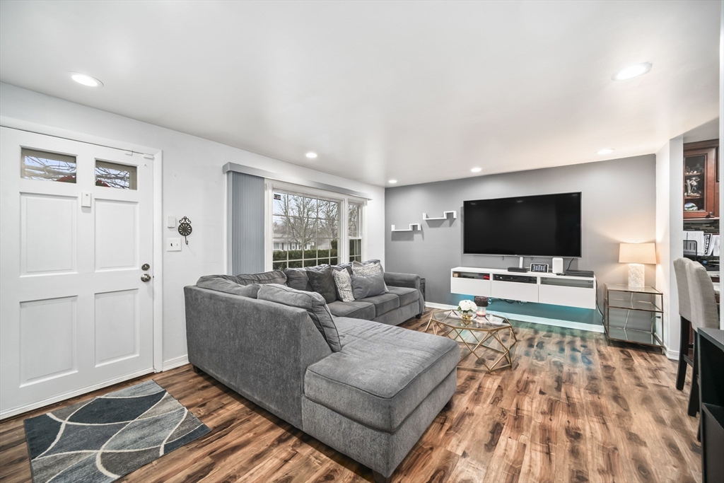 5 Debbie Road Brockton, MA 02302 - Photo 11 of 30 a living room with furniture and a flat screen tv