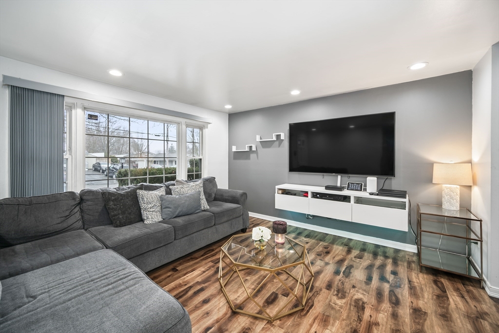 5 Debbie Road Brockton, MA 02302 - Photo 12 of 30 a living room with furniture and a flat screen tv