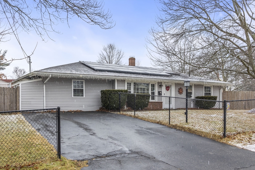 5 Debbie Road Brockton, MA 02302 - Photo 2 of 30 a view of a house with a yard and covered space