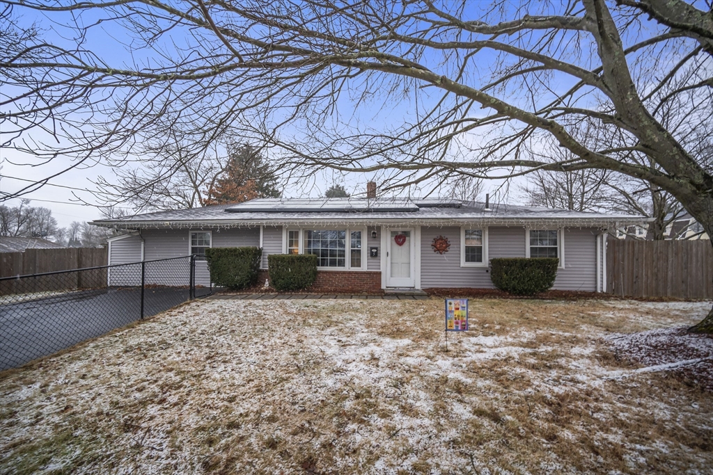 5 Debbie Road Brockton, MA 02302 - Photo 3 of 30 a house that has a tree in front of it